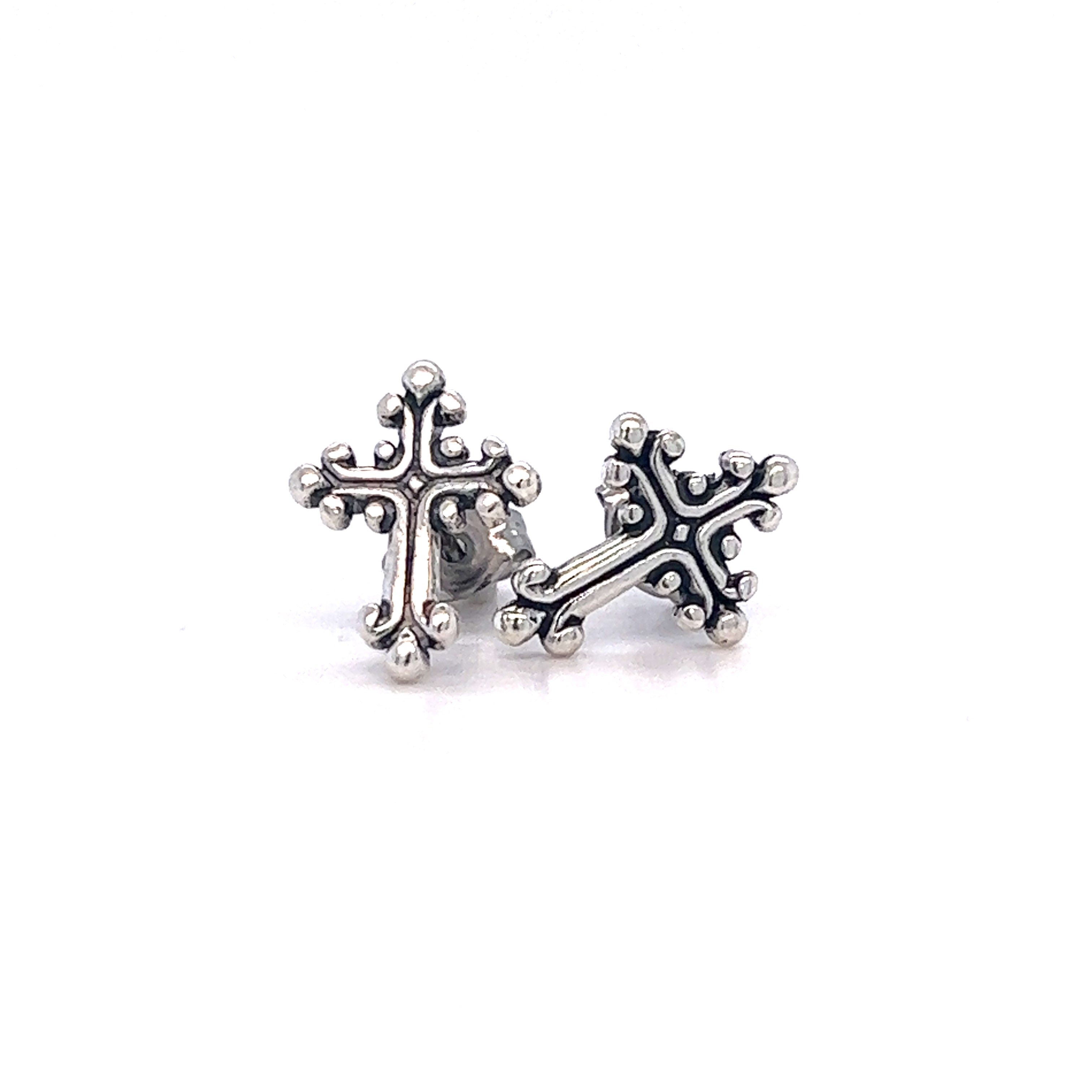 A pair of Super Silver Ornate Cross Studs with oxidized detailing.