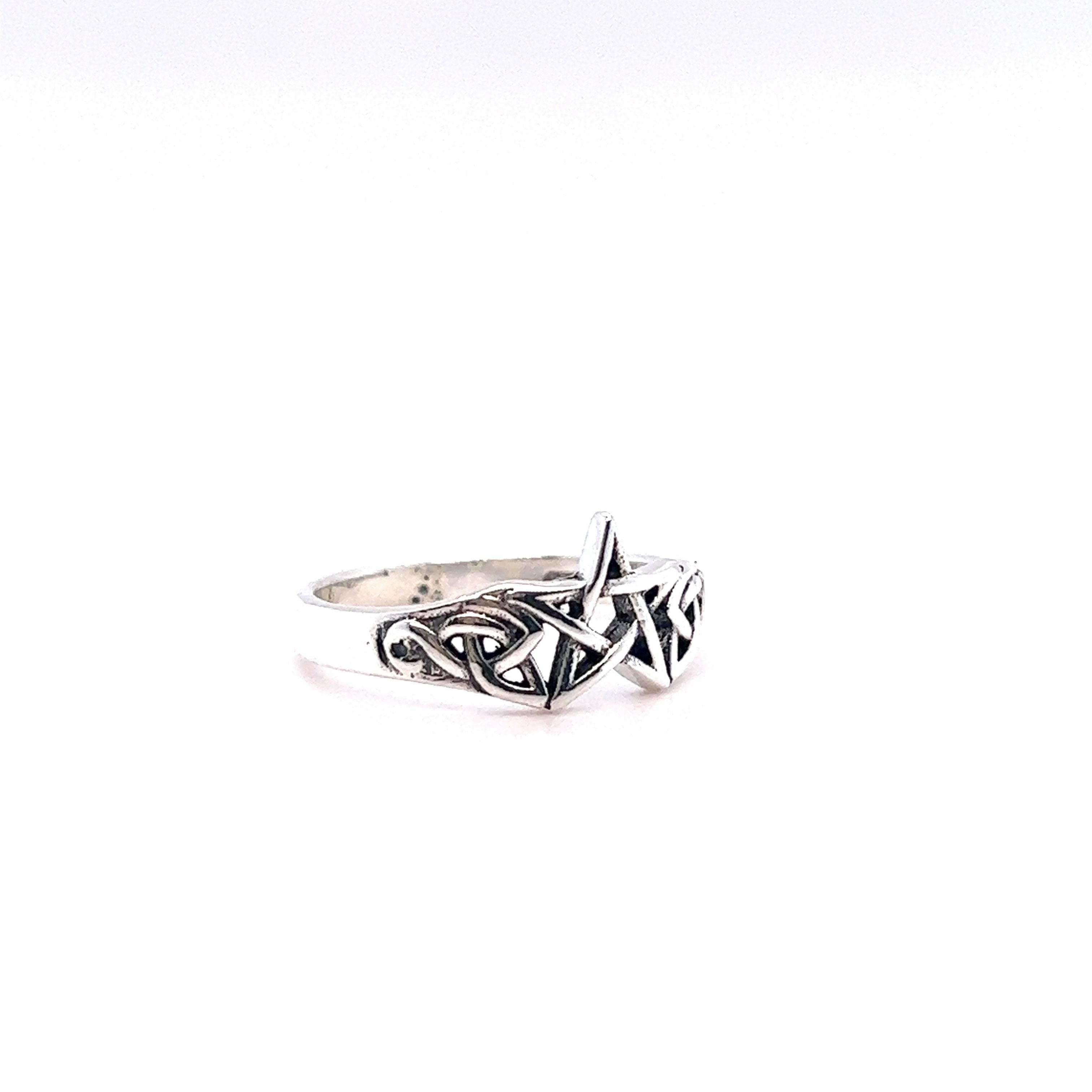 Small Pentagram Ring with Celtic Knot Design crafted in sterling silver.