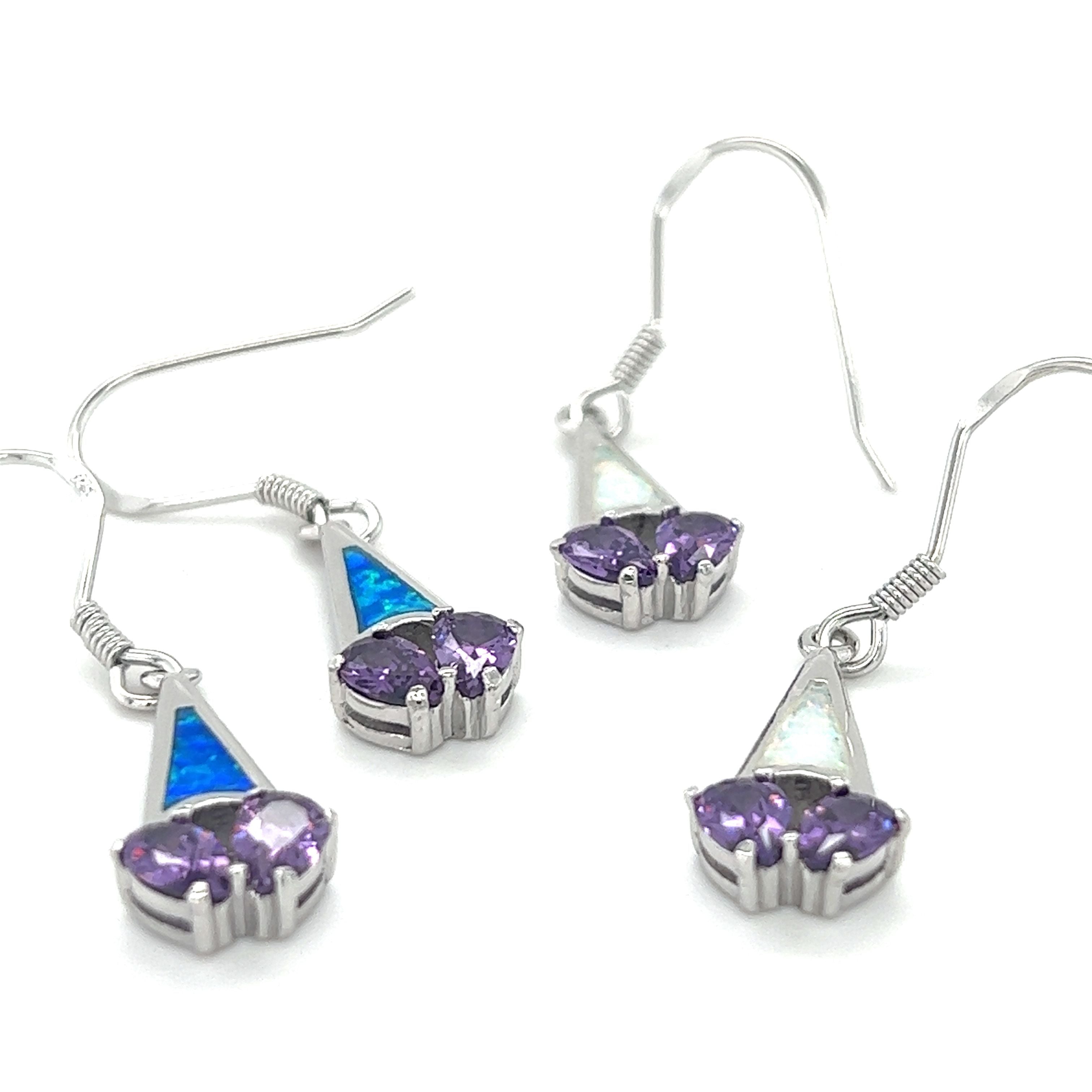 A pair of Super Silver Created Opal Earrings with Purple Cubic Zirconia and a rhodium-plated finish.