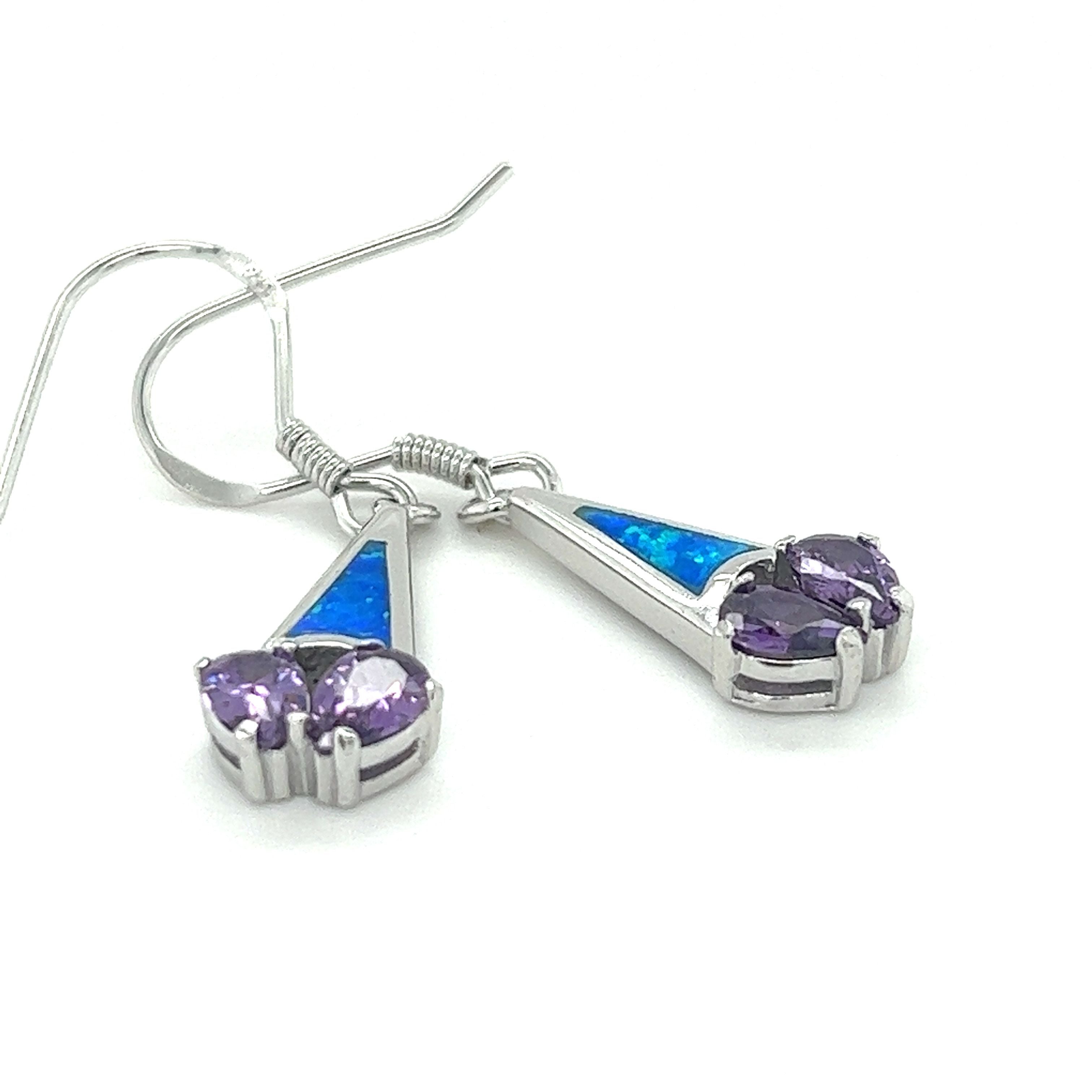 A pair of Super Silver Created Opal Earrings with purple cubic zirconia and amethyst, featuring a sterling silver design and rhodium-plated finish.