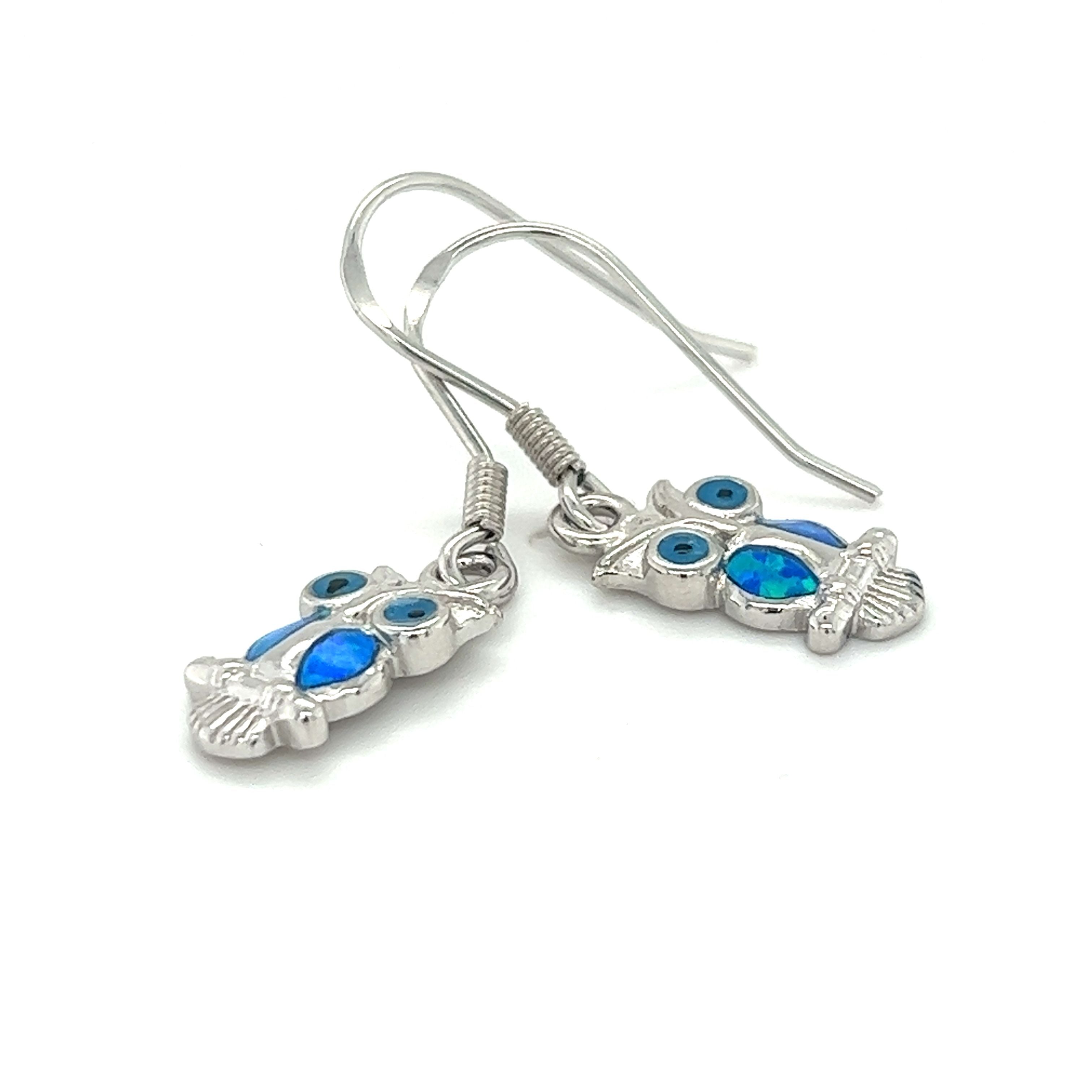 Pair of Lab-Created Opal Owl Earrings with blue and green accents, perfect for showcasing your creativity.