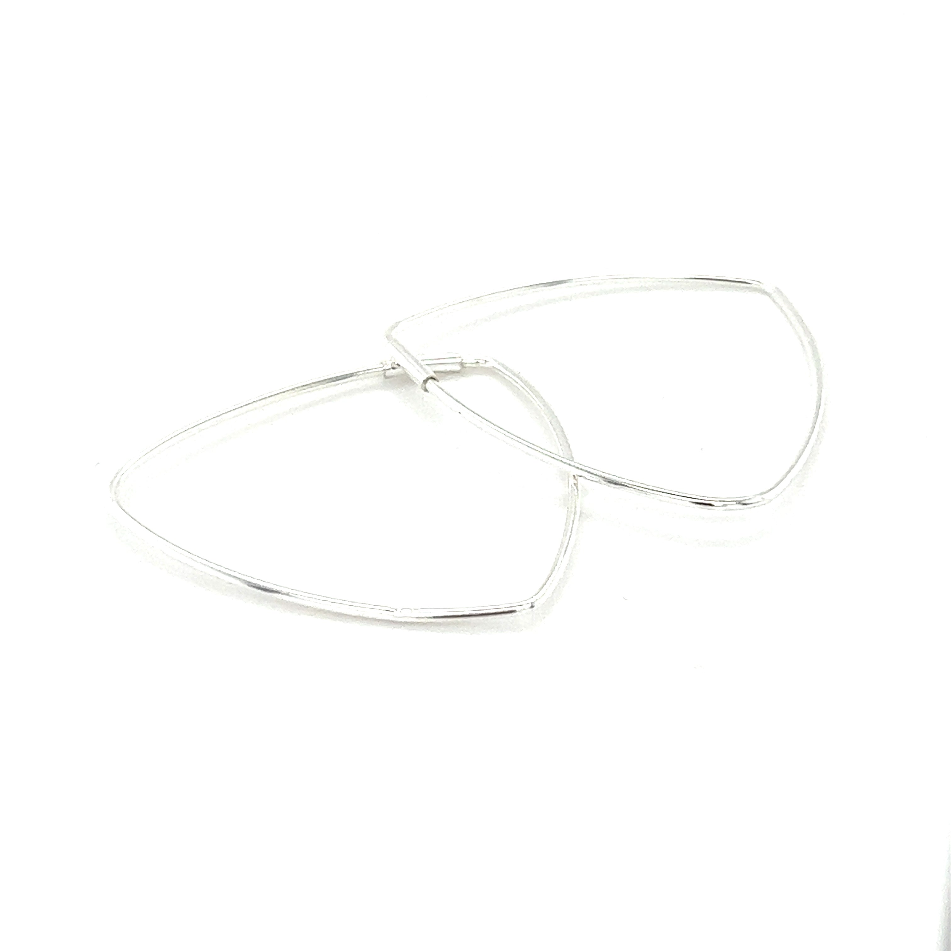 A pair of Delicate Triangle Shaped Hoops by Super Silver on a white surface.