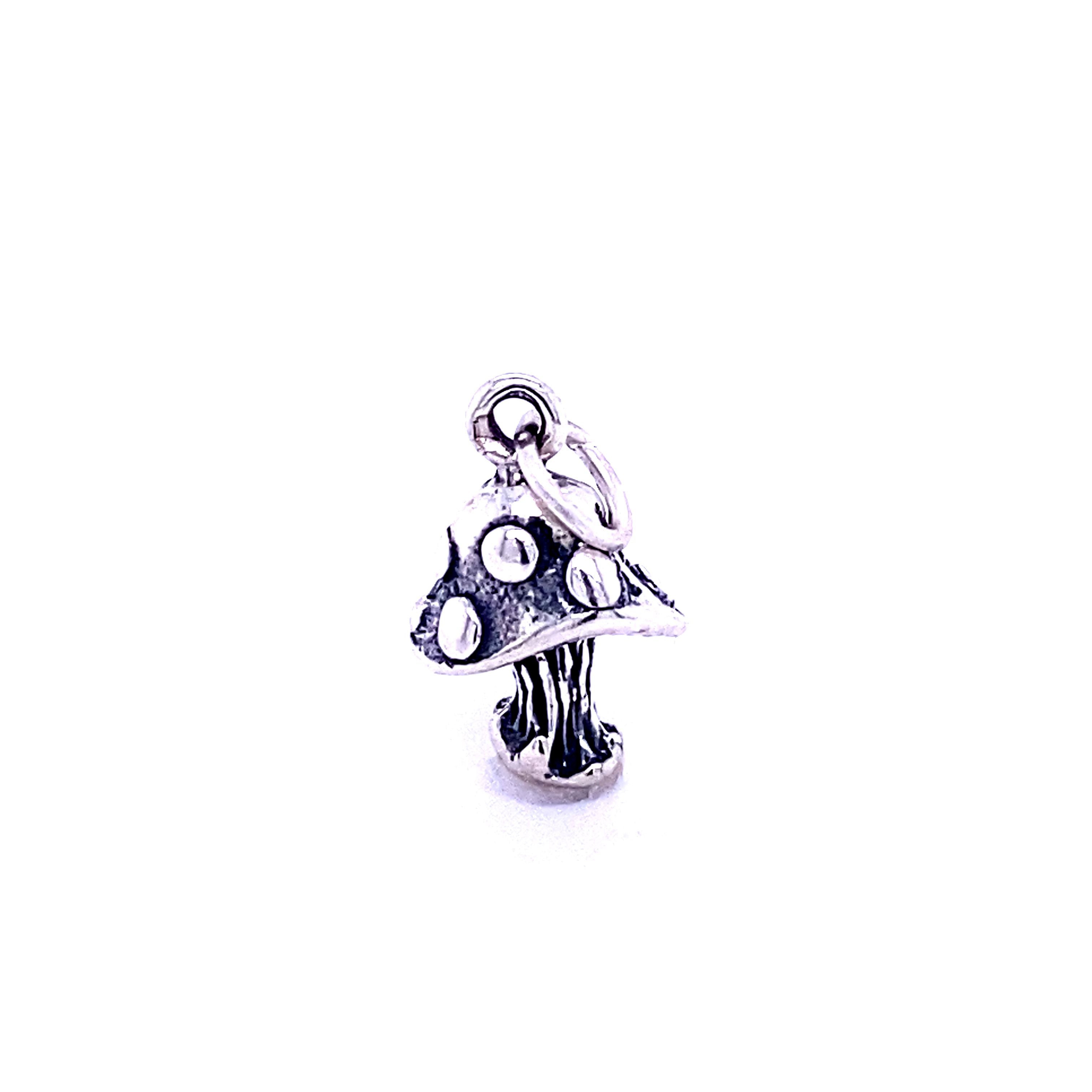 A Super Silver Mystical Mushroom charm on a white background, adding a touch of fantasy to any collection of charms.