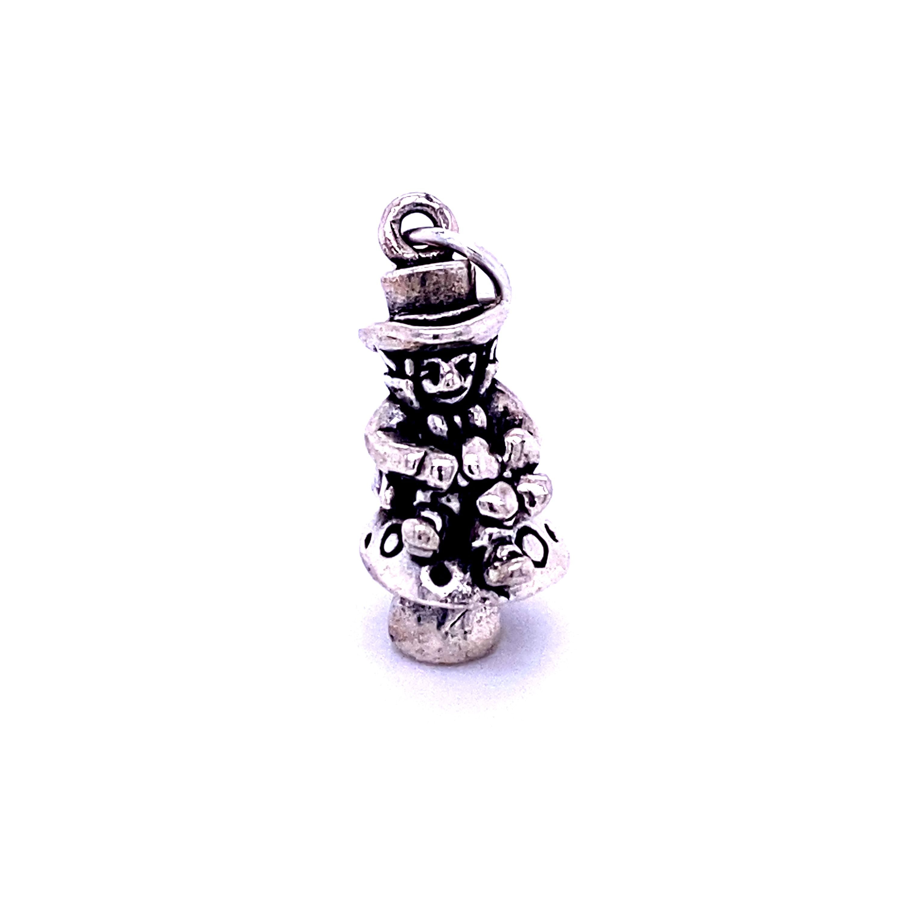 A Super Silver Mystical Mushroom Charm with a mushroom-shaped hat on it.