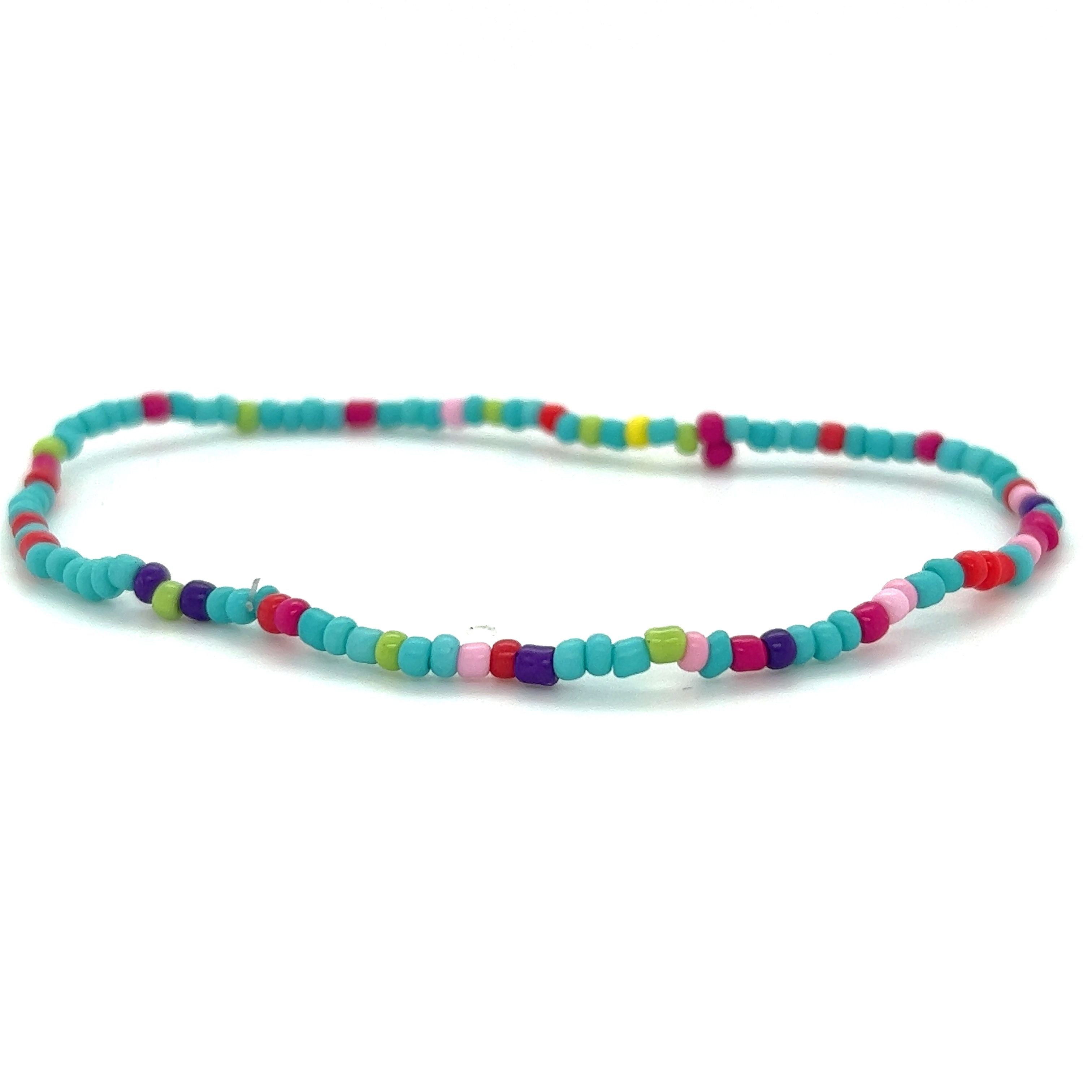 A vibrant Super Silver Dainty Beaded Bracelet on a plain white background.