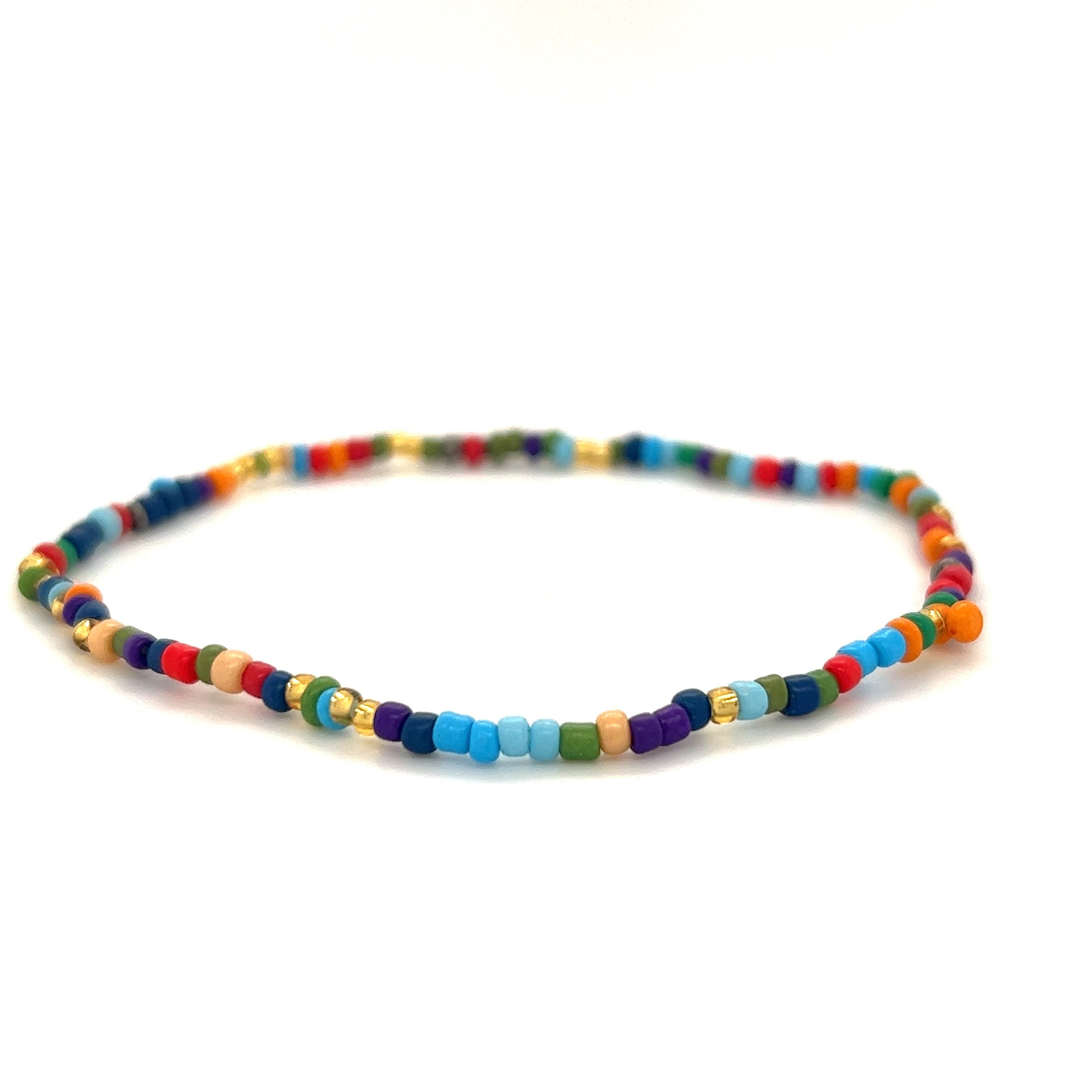 A Dainty Beaded Bracelets on a white background by Super Silver.