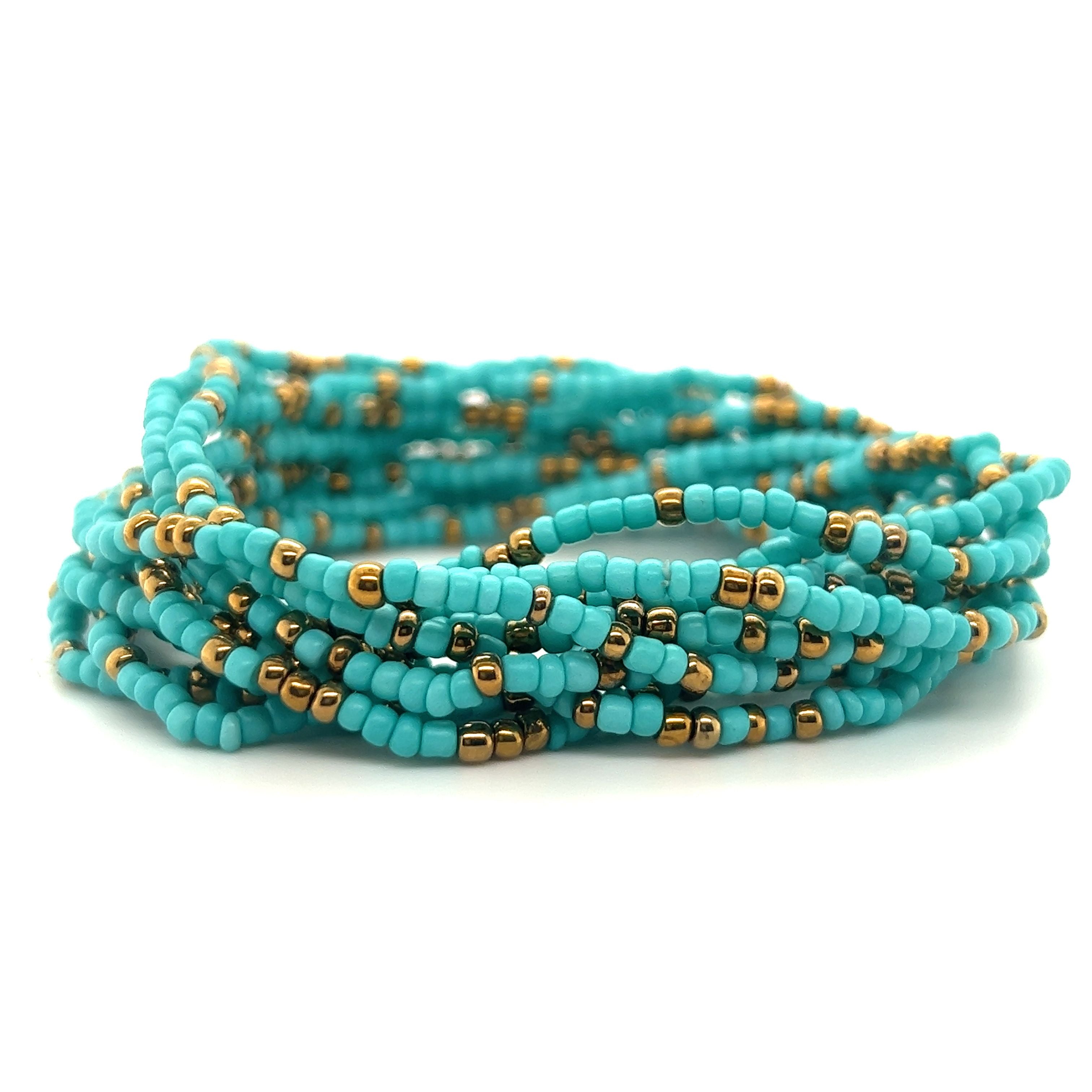 Super Silver's Dainty Beaded Bracelet in turquoise and gold with vibrant colors.