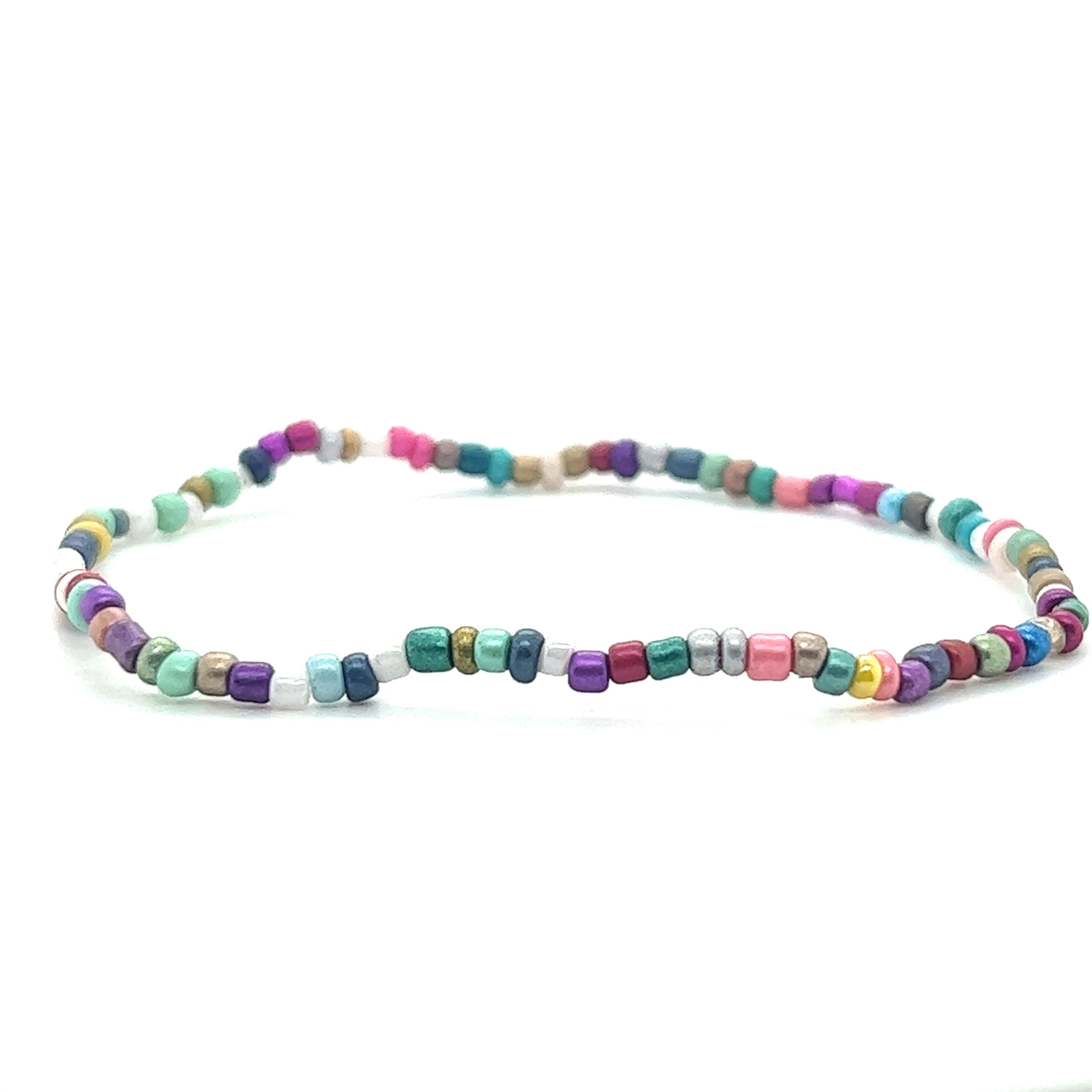 A Super Silver Dainty Beaded Bracelet on a white background.