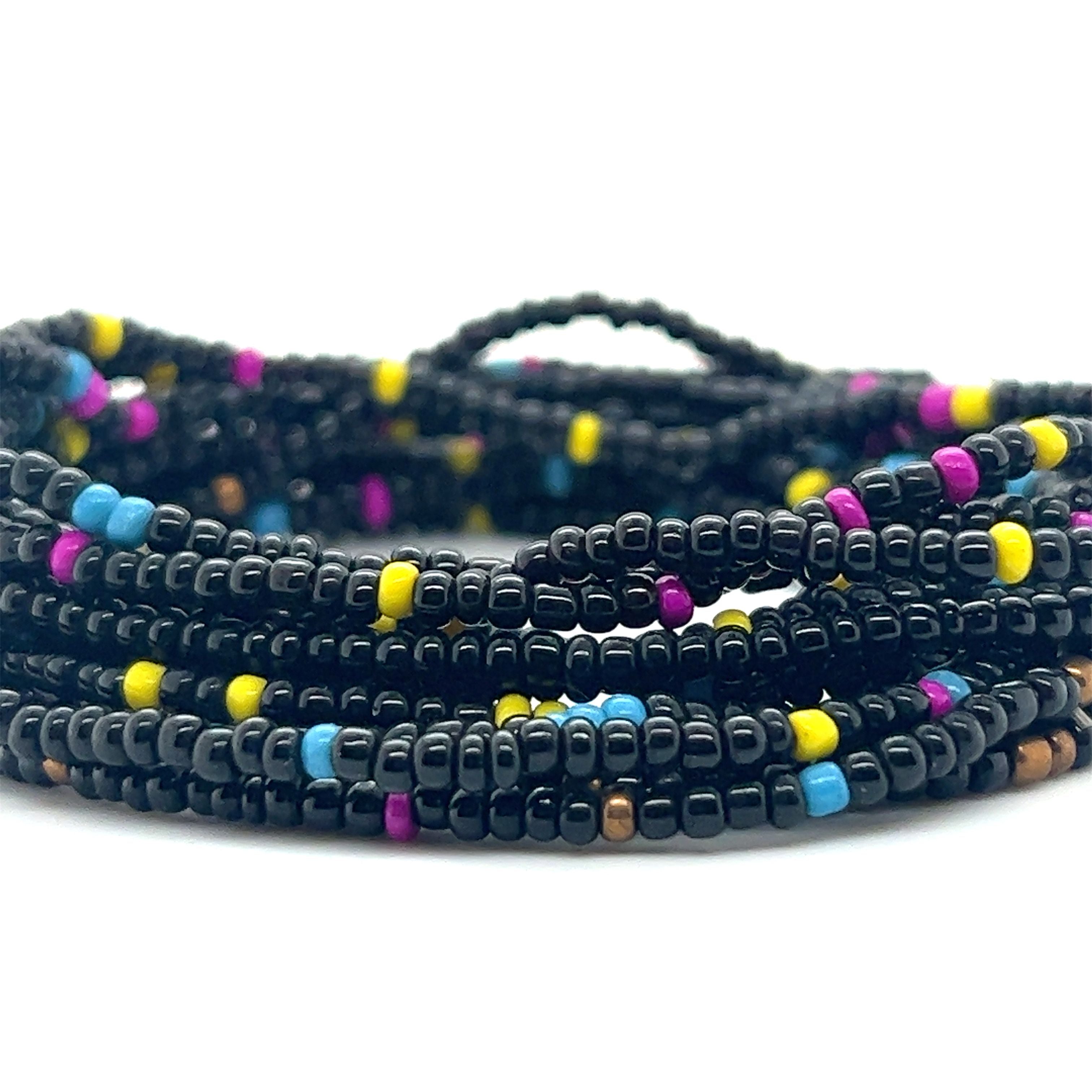 A Super Silver Dainty Beaded Bracelet with vibrant colors.