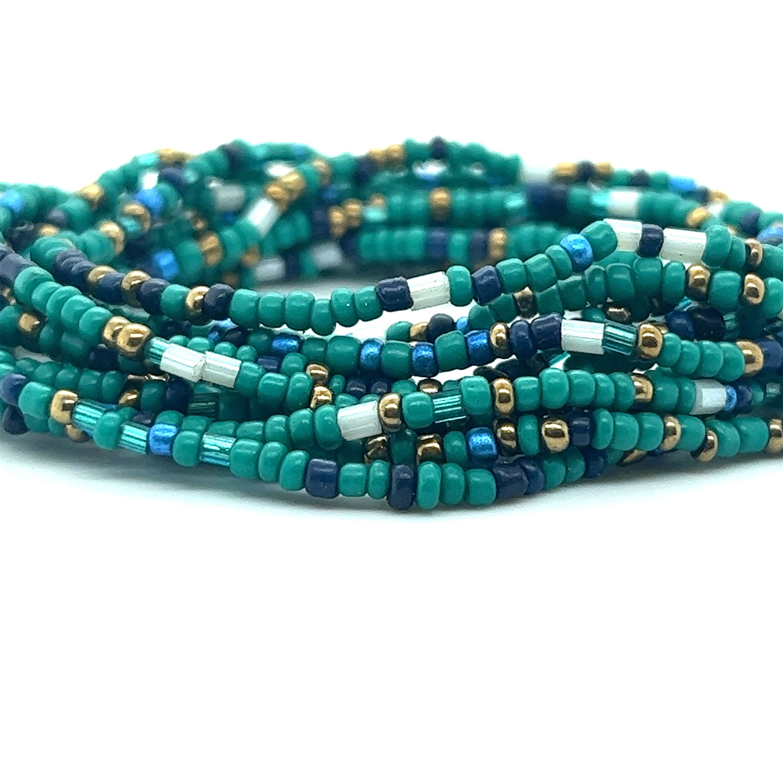 A Super Silver green and blue Dainty Beaded Bracelets on a white background.