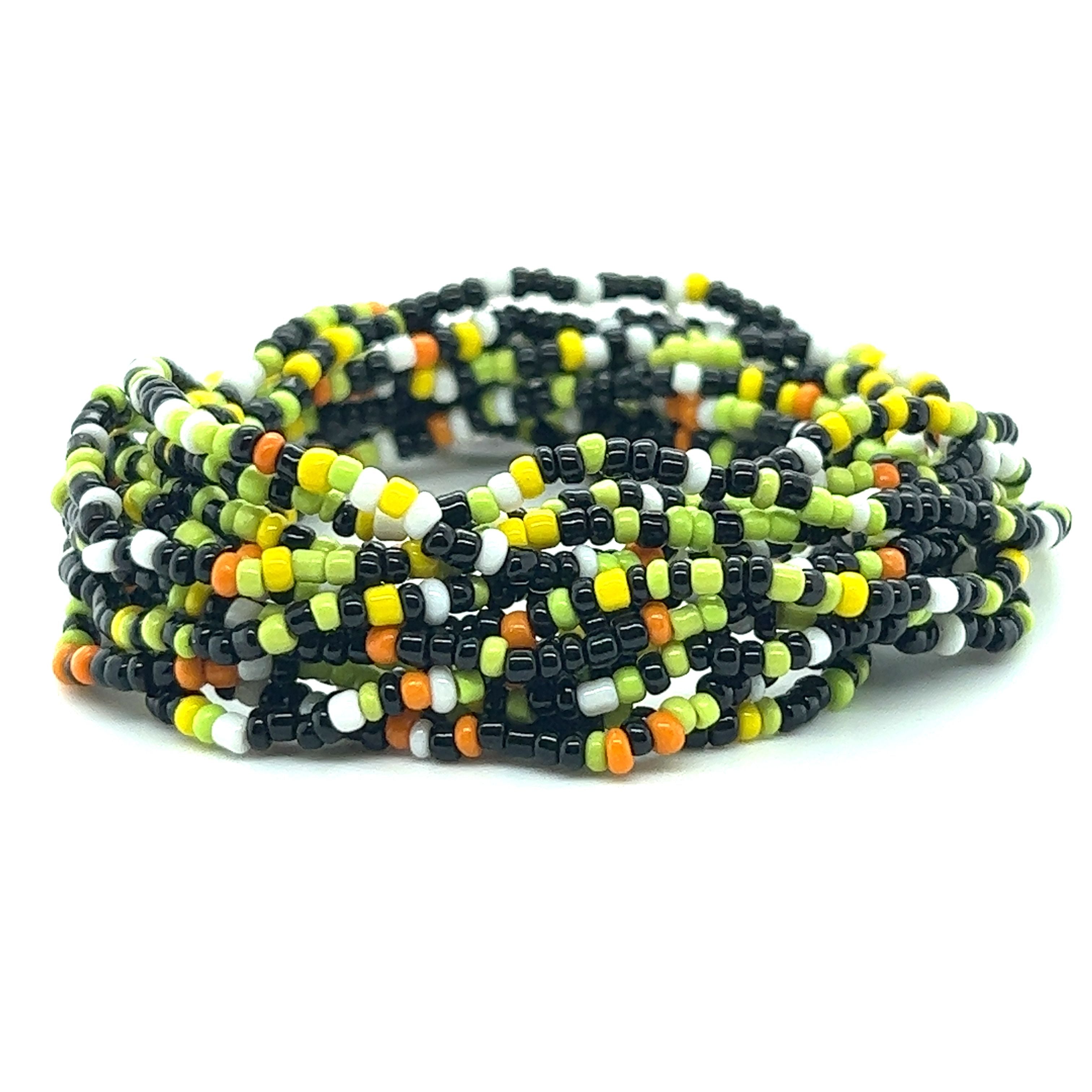 A Dainty Beaded Bracelet with black and orange colors on a white background, by Super Silver.