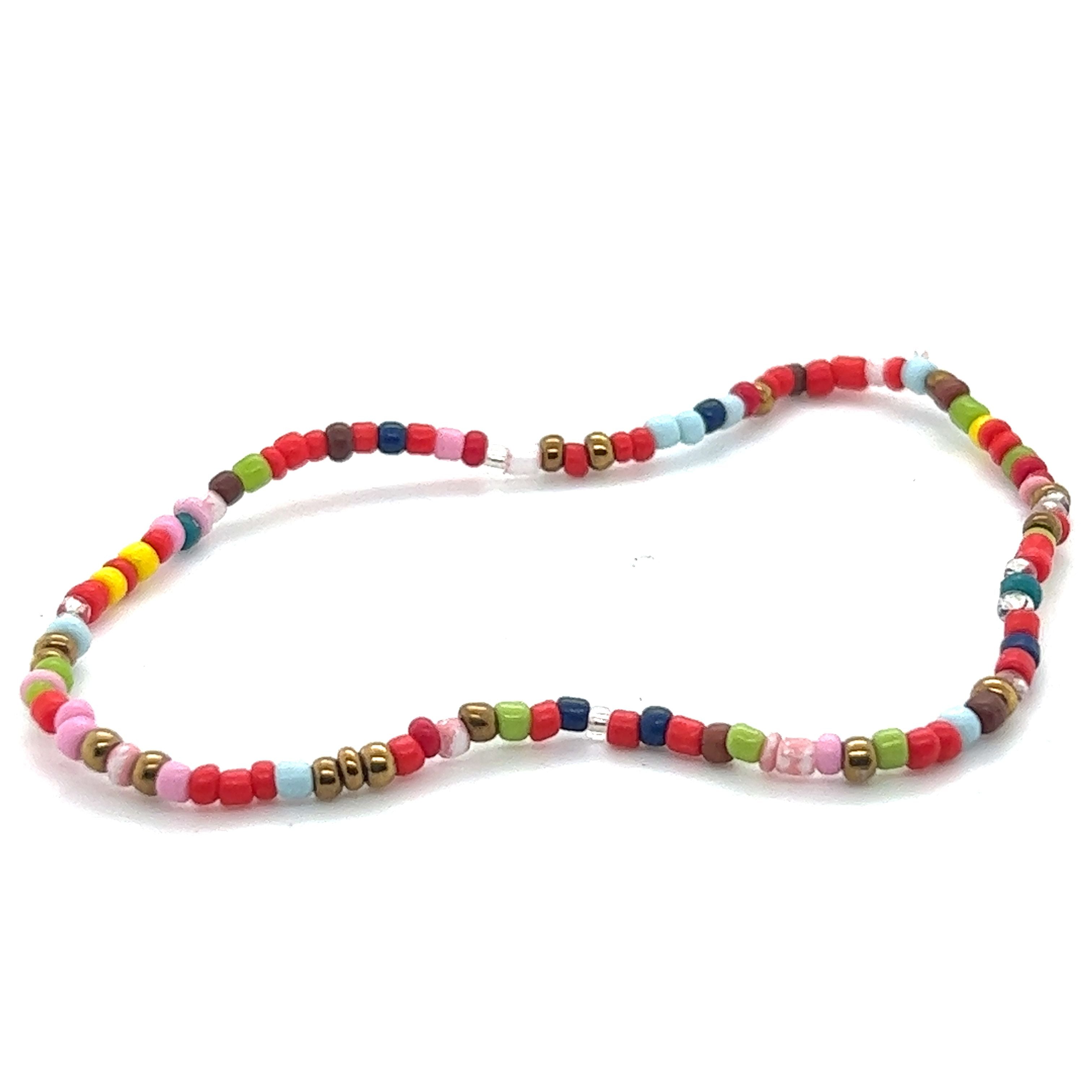 A vibrant Super Silver Dainty Beaded Bracelet on a white background.