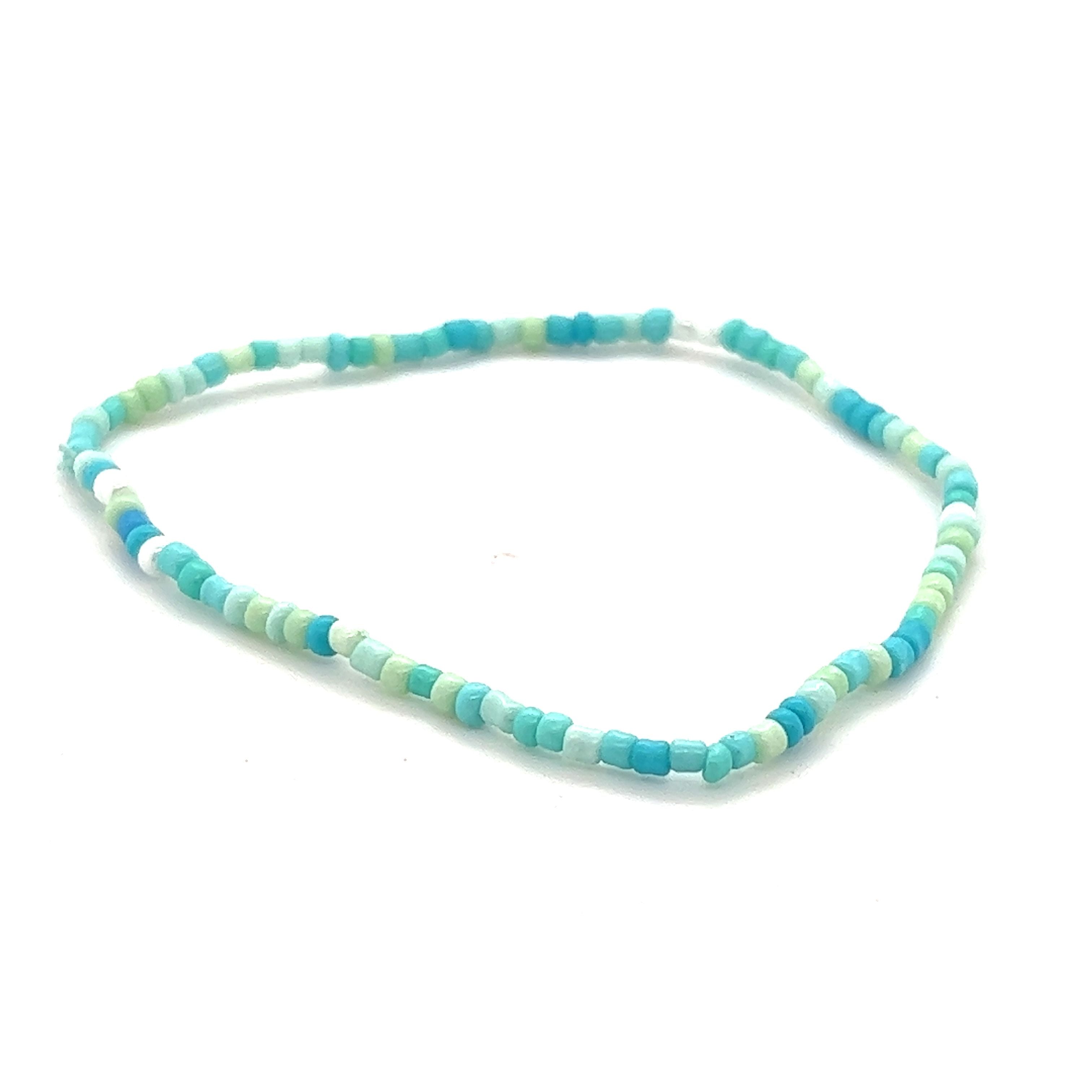 A Super Silver Dainty Beaded Bracelet on a white background.