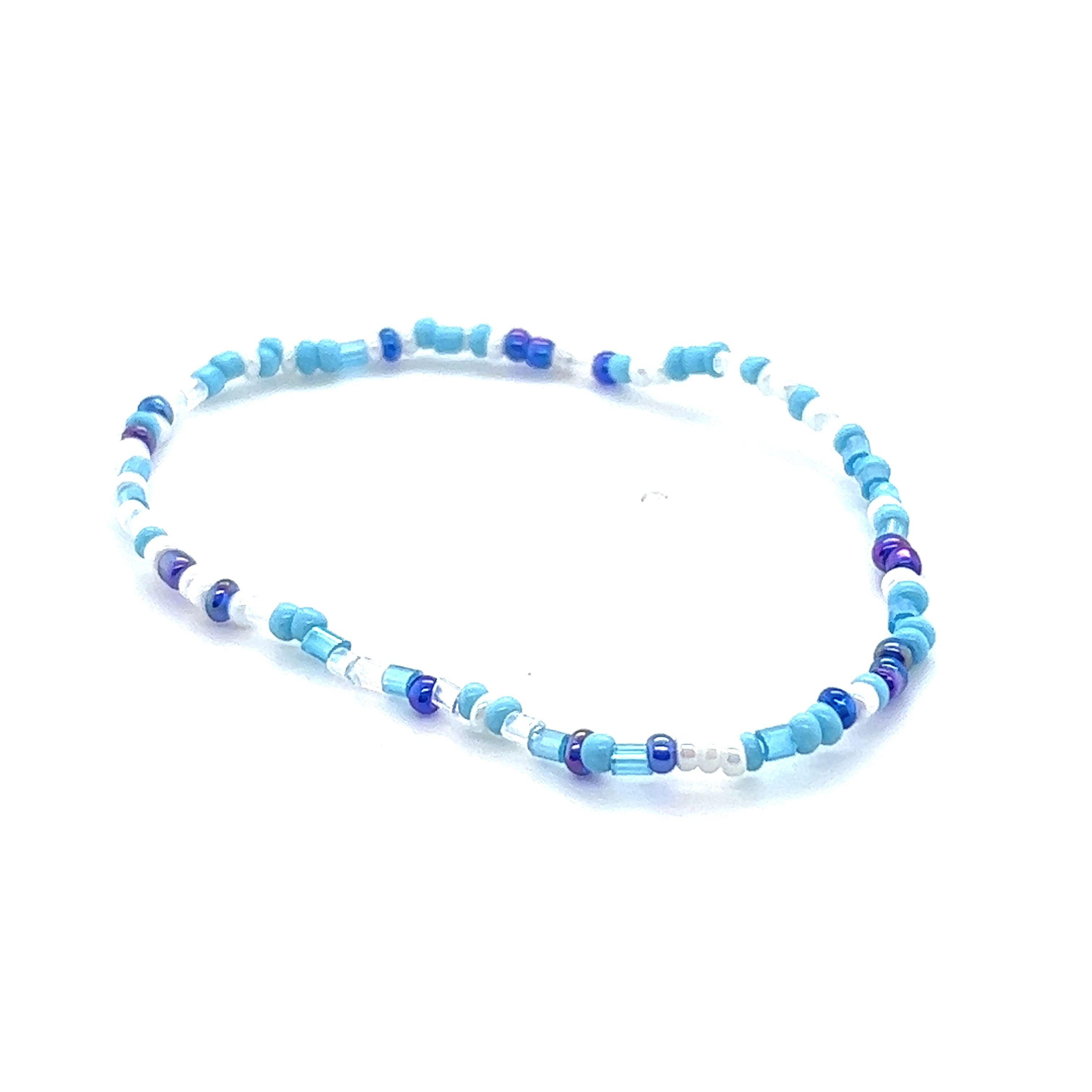 A Super Silver Dainty Beaded Bracelet on a white background.