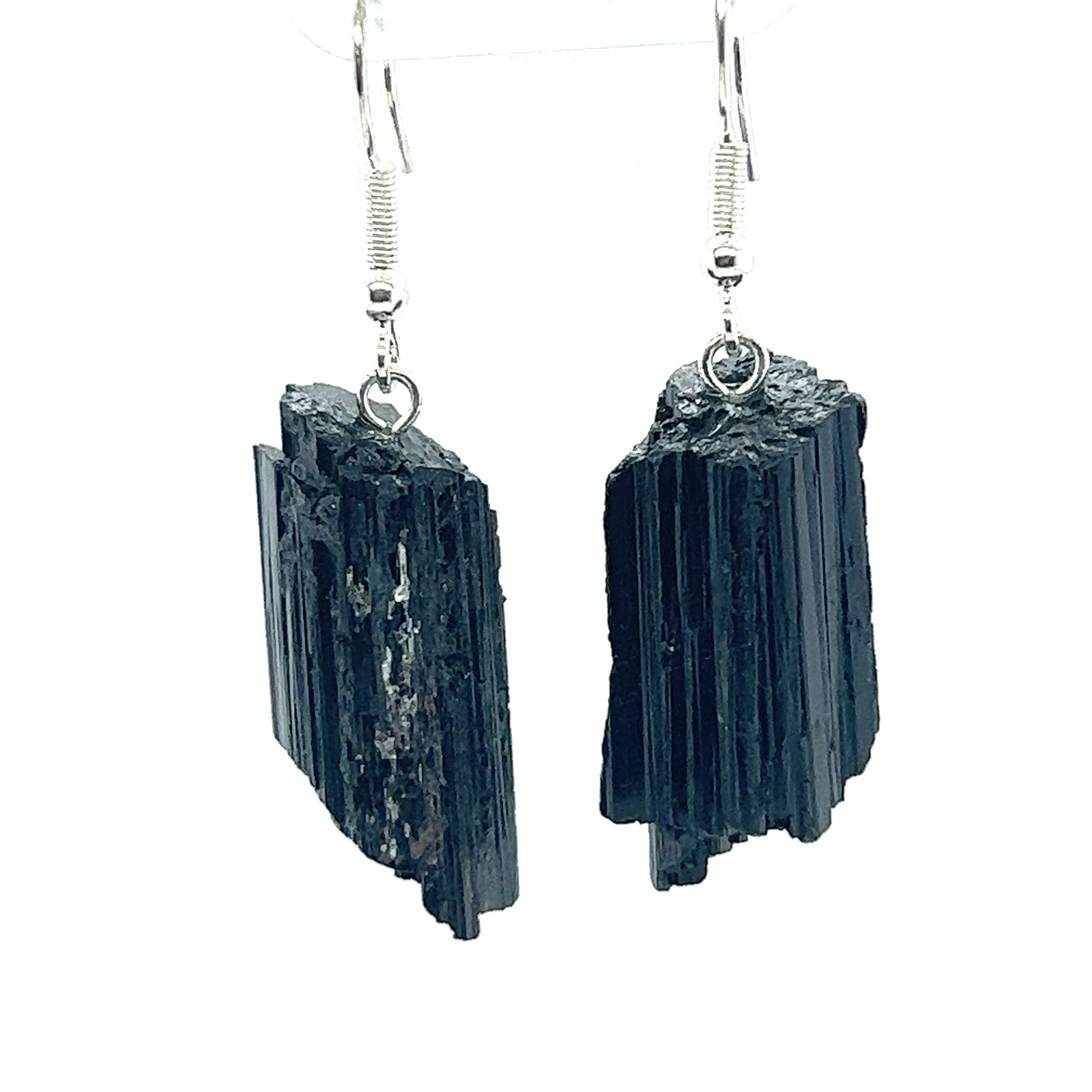 Super Silver Raw Crystal Earrings featuring amethyst crystals.