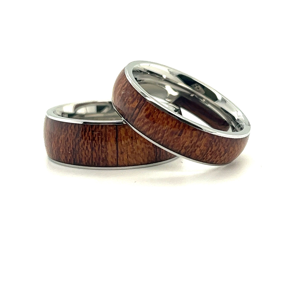 Two Super Silver Koa Wood Stainless Steel Rings on a white background.