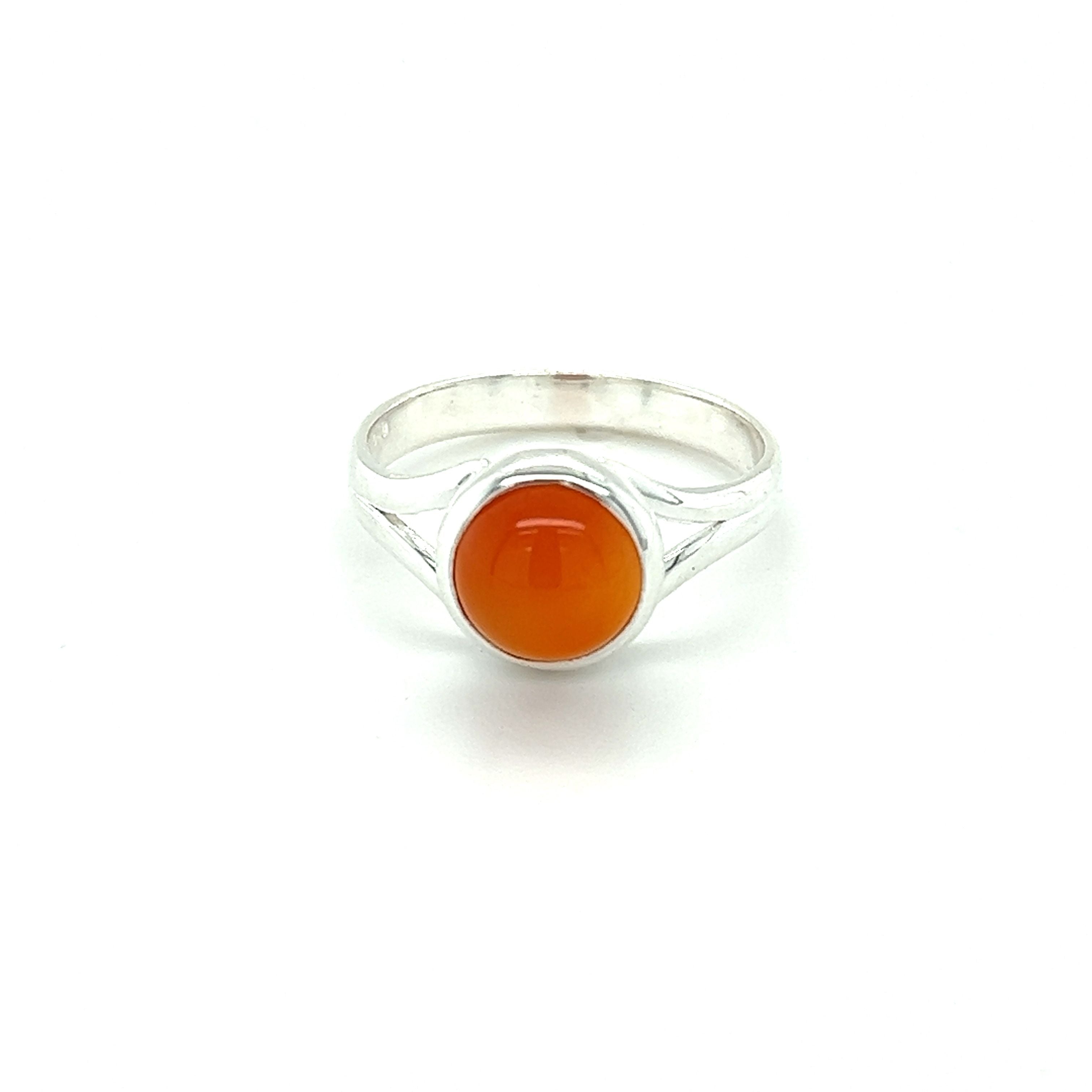 A Simple Vibrant Circular Stone Ring with a natural orange stone from Super Silver.
