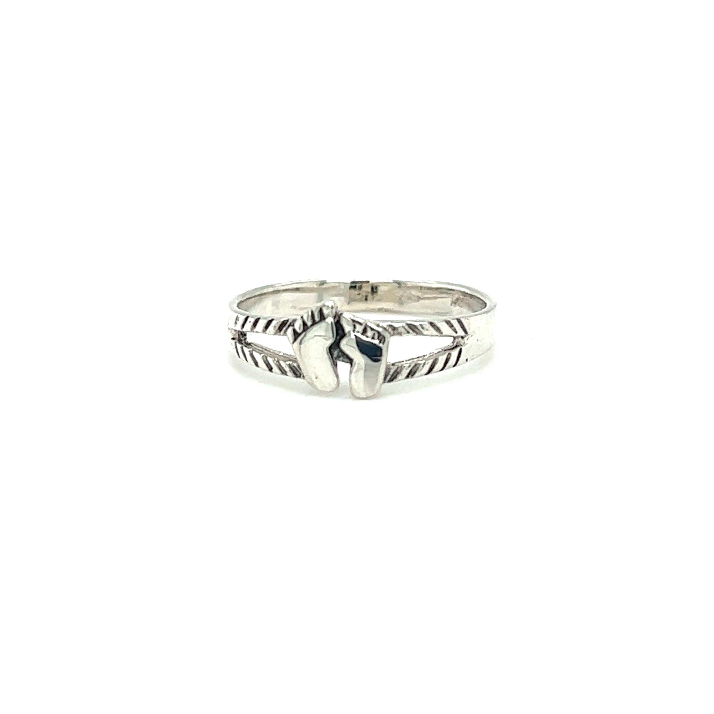 A Super Silver Silver Footprint ring with symbolism