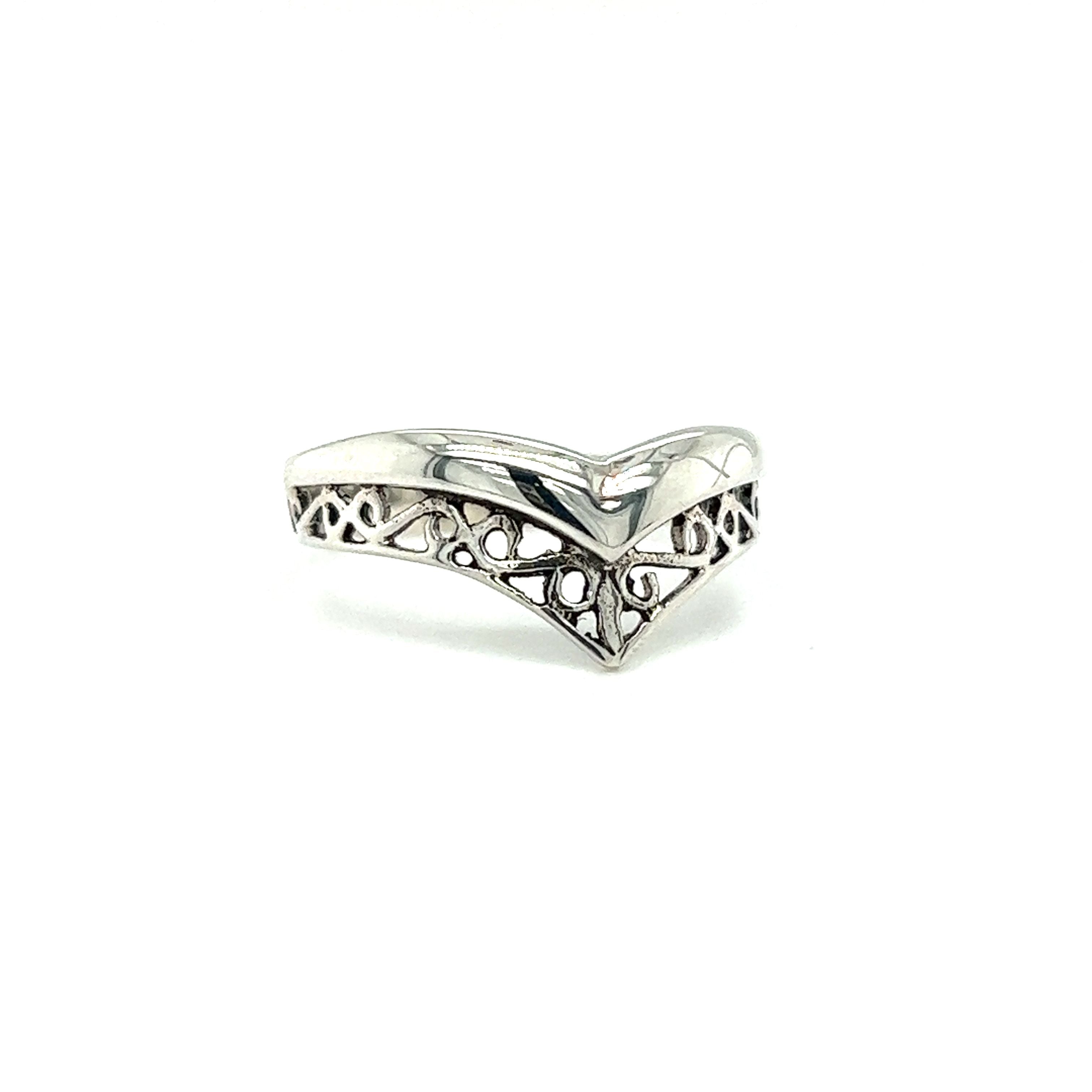 A stackable silver Filigree Chevron Ring with a minimalist and intricate chevron design.