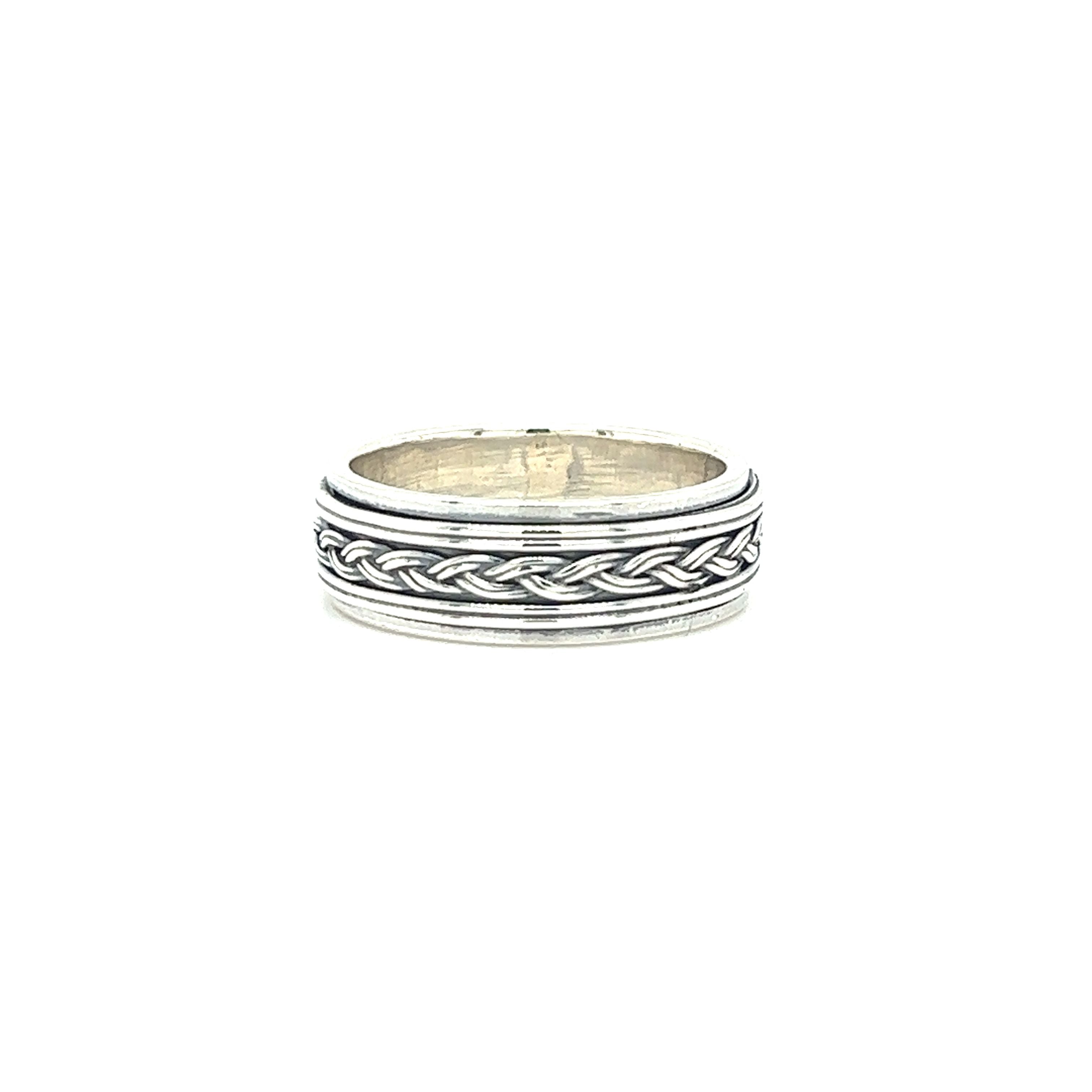 A Silver Rope Spinner Ring with a braided design.