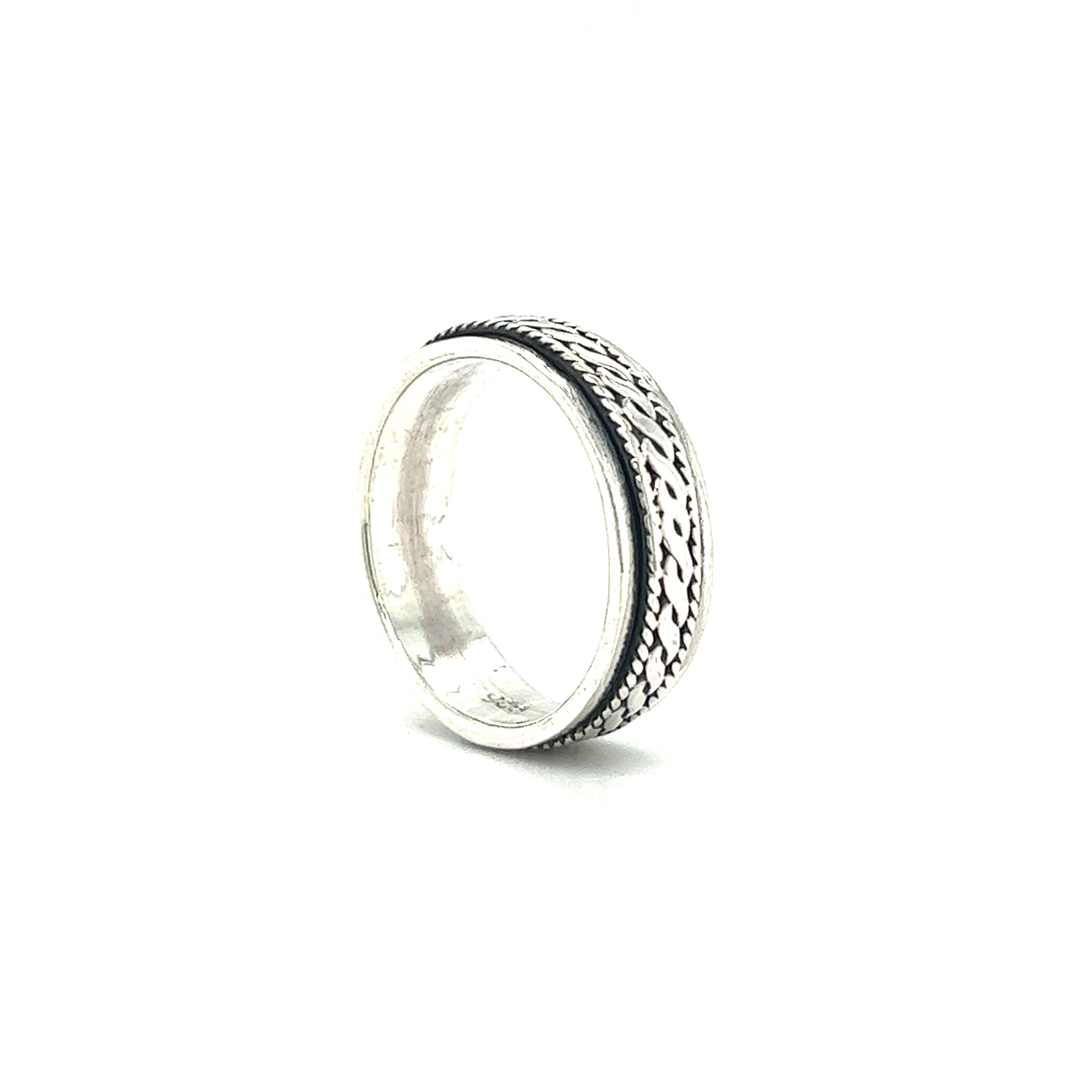 A Spinner Ring With Rope Design.
