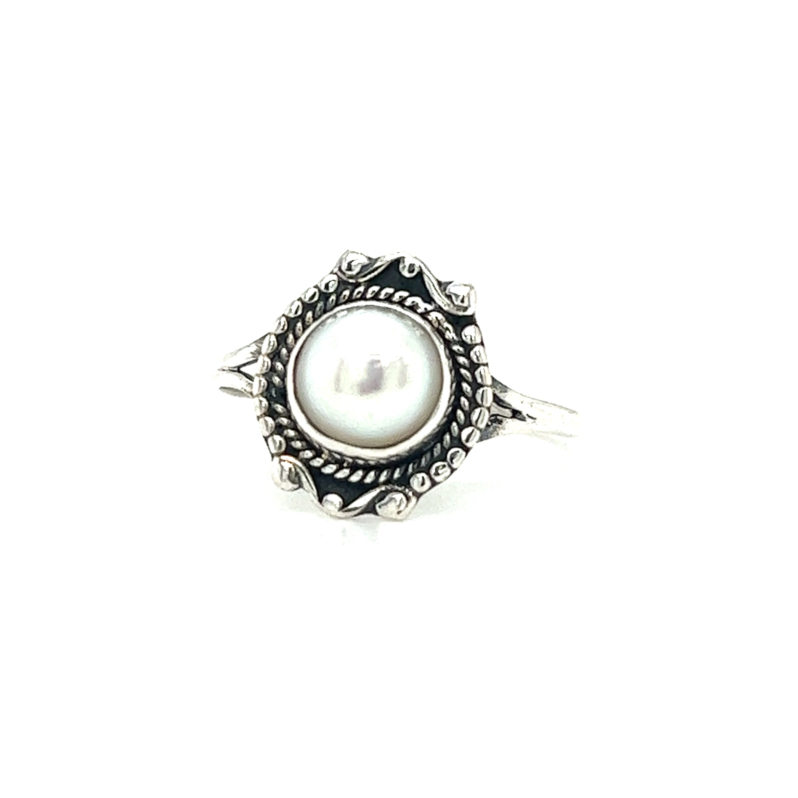 A Super Silver Round Gemstone Ring With Vintage Setting, resting on a white background.