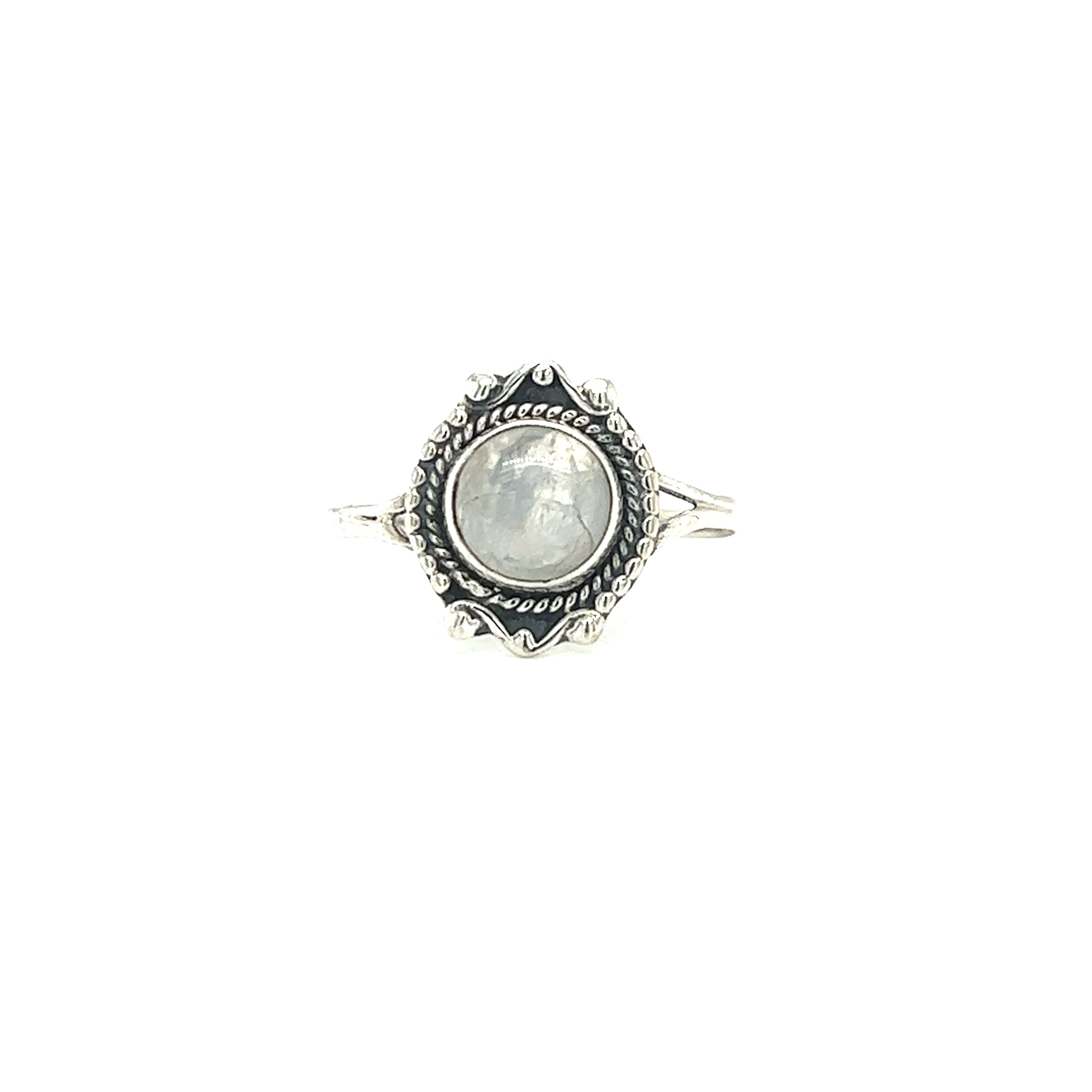 A Round Gemstone Ring With Vintage Setting crafted in .925 Sterling Silver. The bohemian sophistication of this piece is accentuated by the white stone set beautifully in the center from Super Silver.