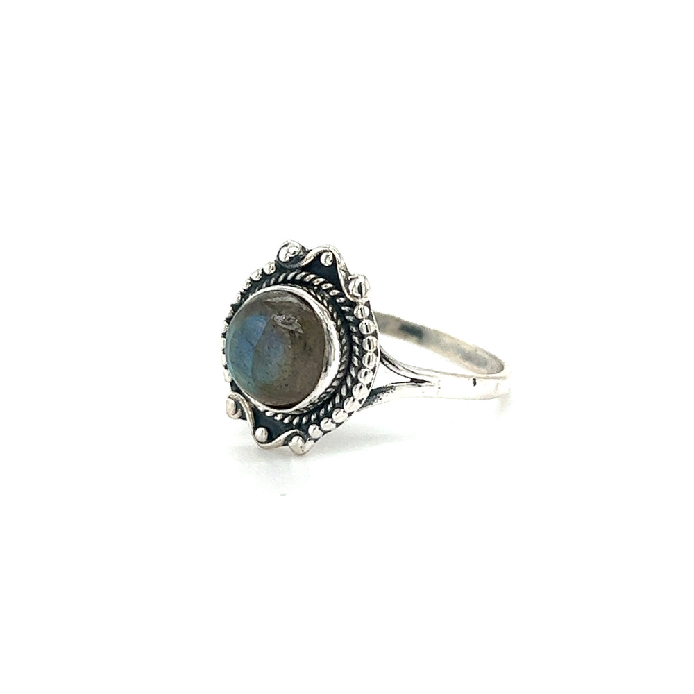 
                  
                    Round Gemstone Ring With Vintage Setting in sterling silver with a mesmerizing stone.
                  
                