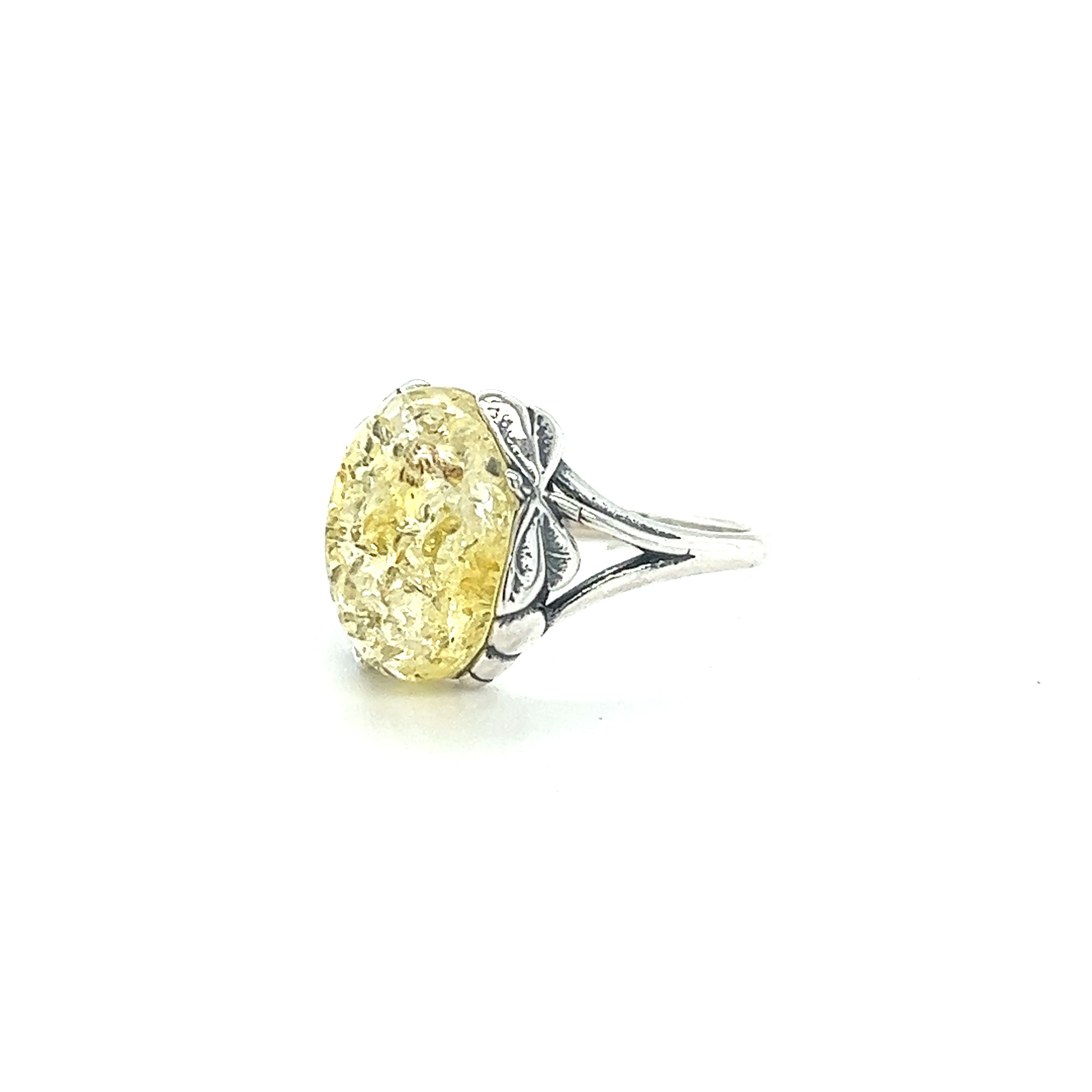 A Super Silver Dragonfly Band Amber Ring.