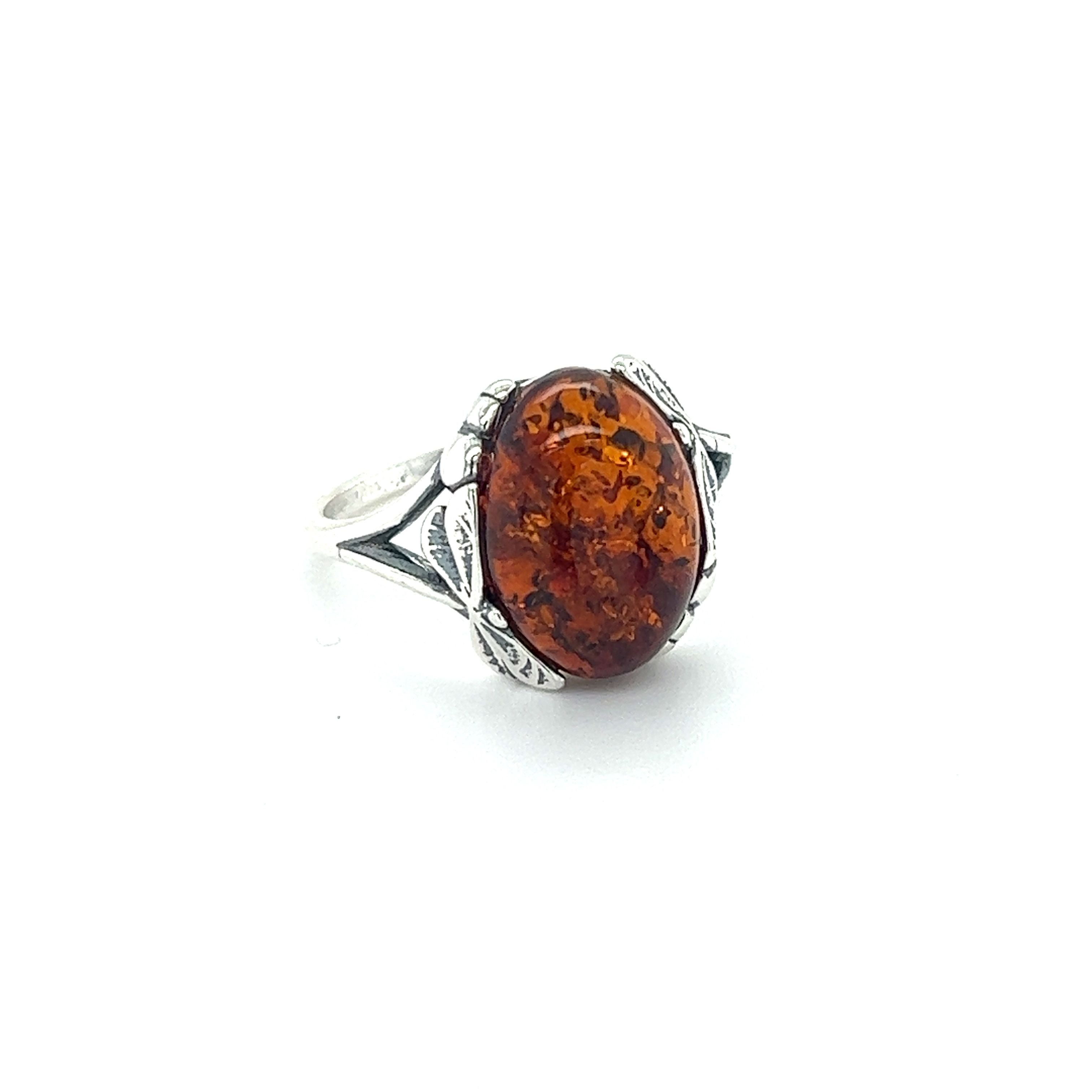 Stunning Dragonfly Band Amber Ring featuring Baltic amber stones set in Super Silver.