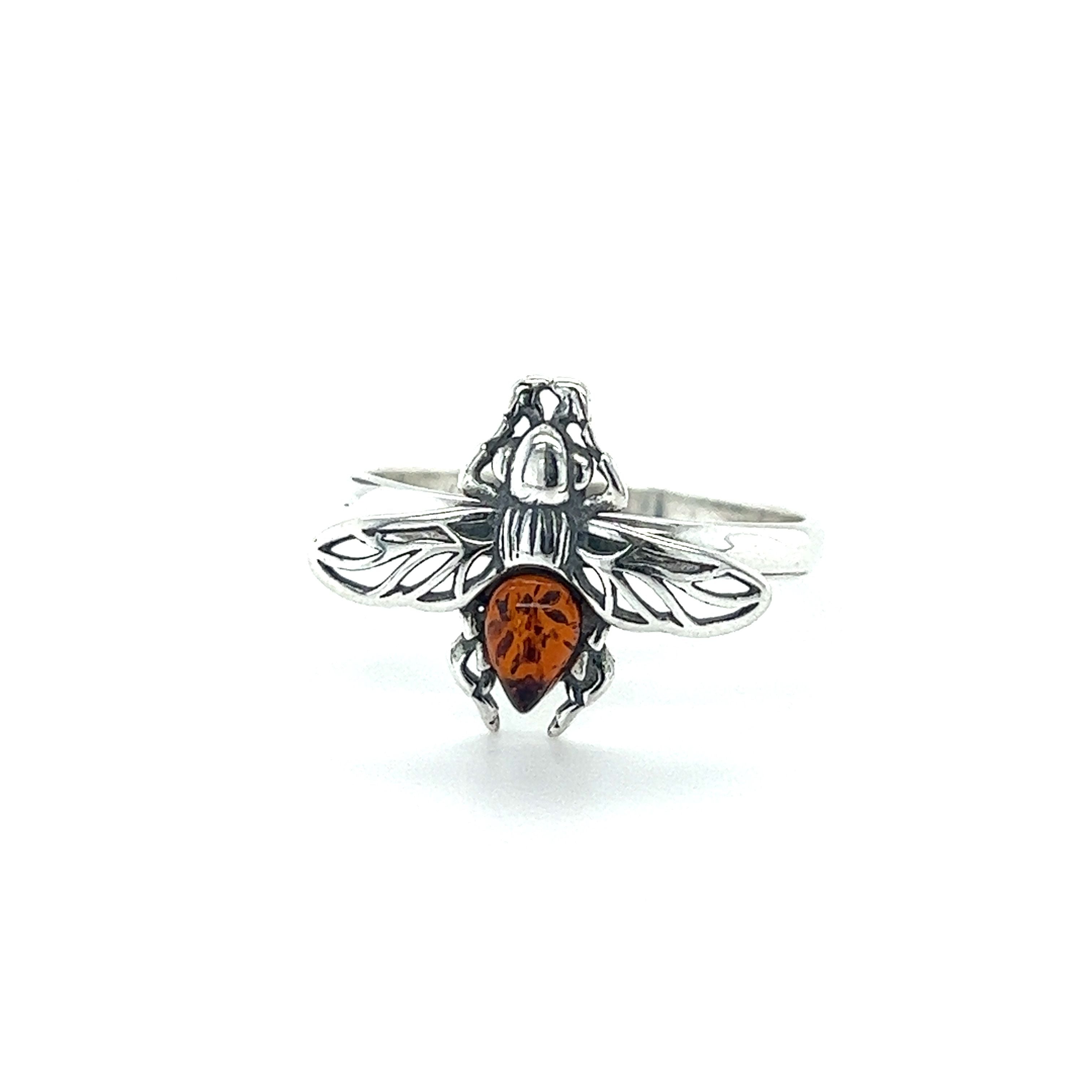 A Detailed Baltic Amber Bee Ring featuring a bee design by Super Silver.