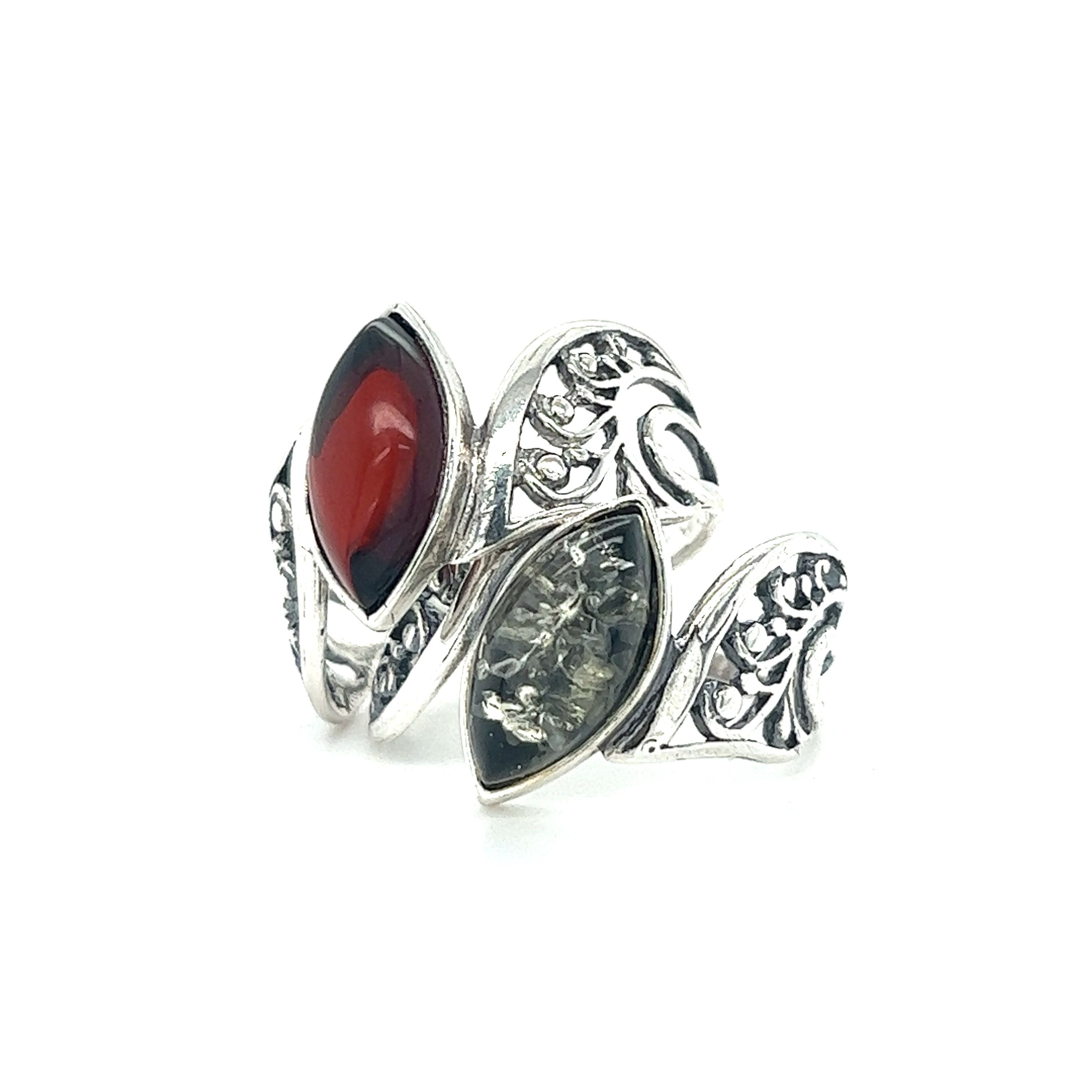 A Super Silver Wide Filigree Band Baltic Amber Ring with red and black stones.