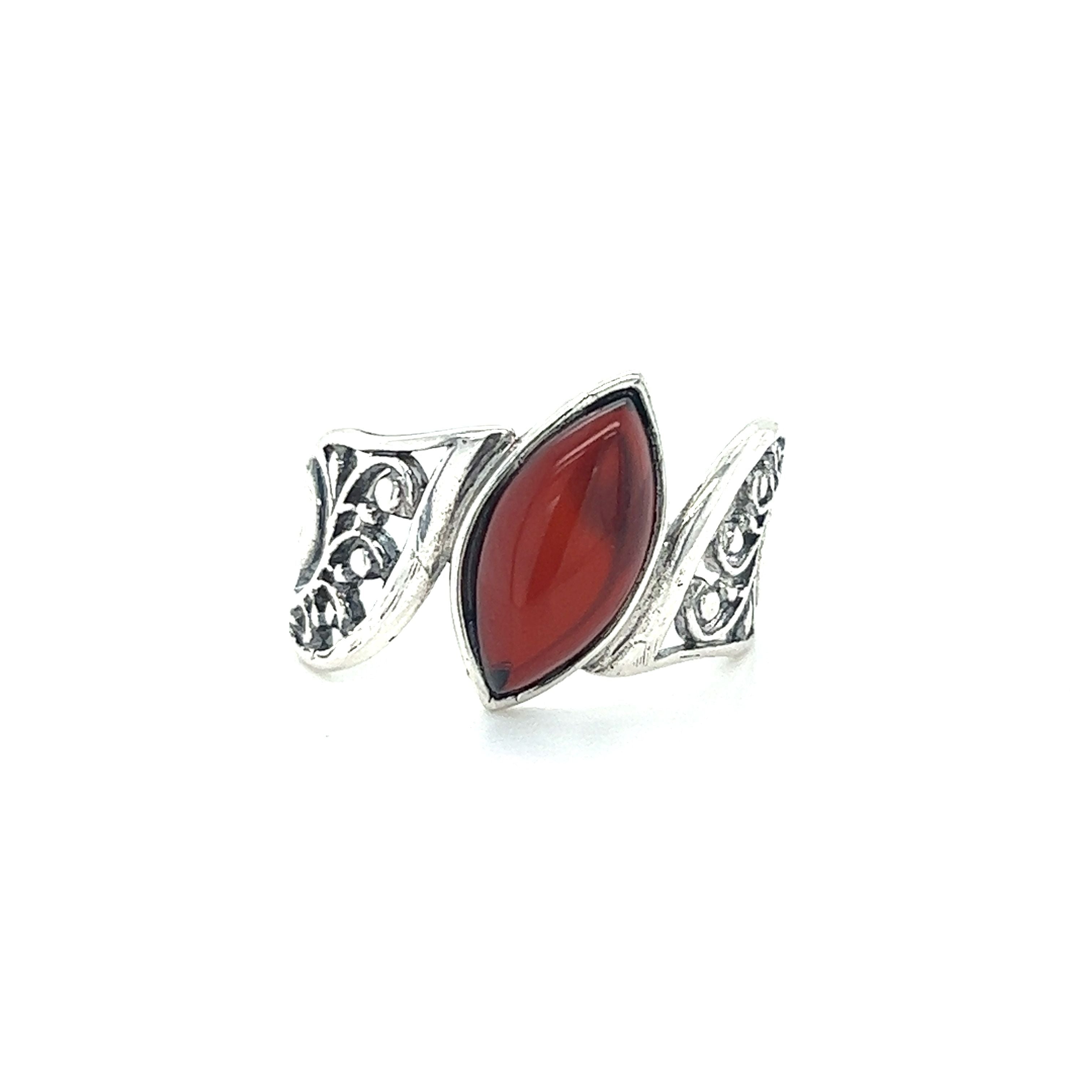 A vintage Super Silver Wide Filigree Band Baltic Amber Ring.