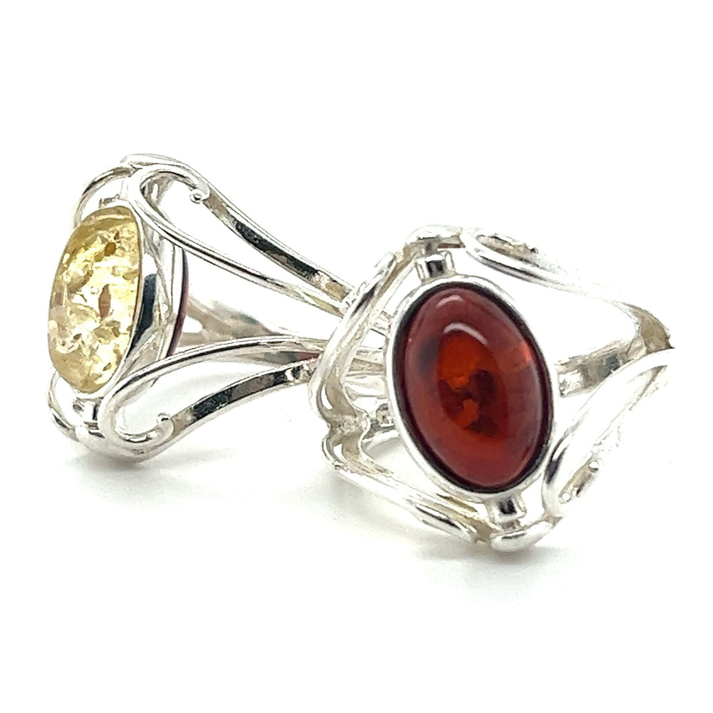 A Rotating Lemon and Cherry Amber Ring with a Baltic amber stone by Super Silver.