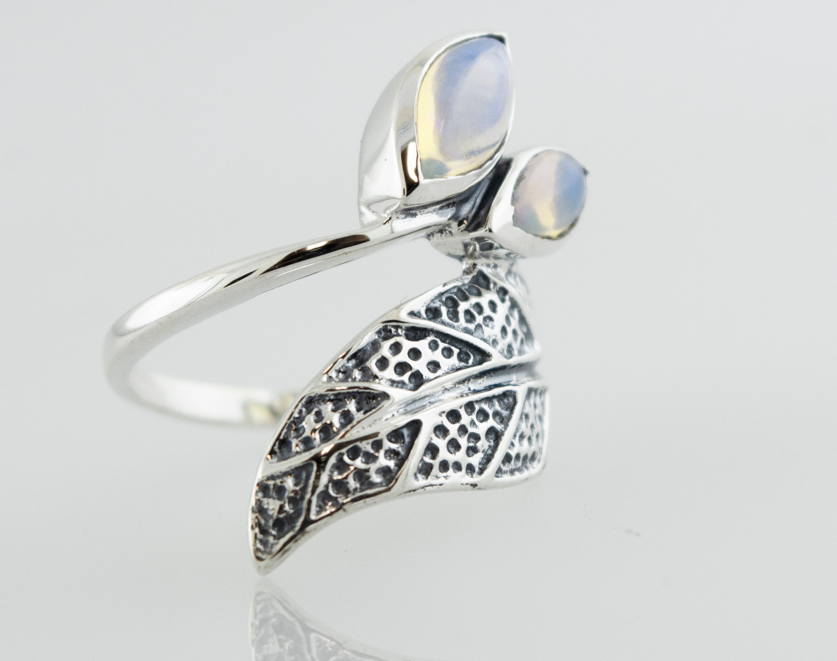 A Leaf Ring with Ethiopian Opal crafted in 925 Sterling Silver, adorned with delicate leaves by Super Silver.