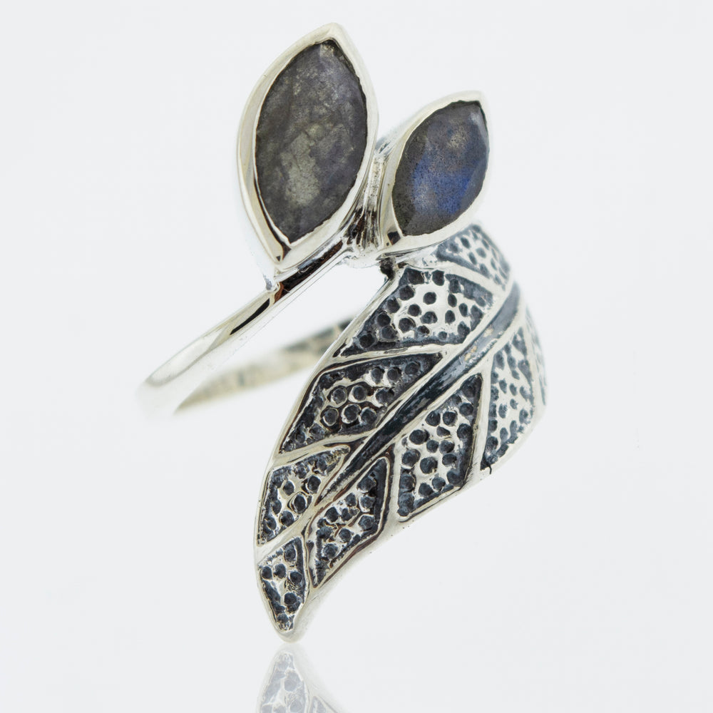 A Super Silver Leaf Ring with Labradorite adorned with two exquisite leaves and a mesmerizing labradorite stone.