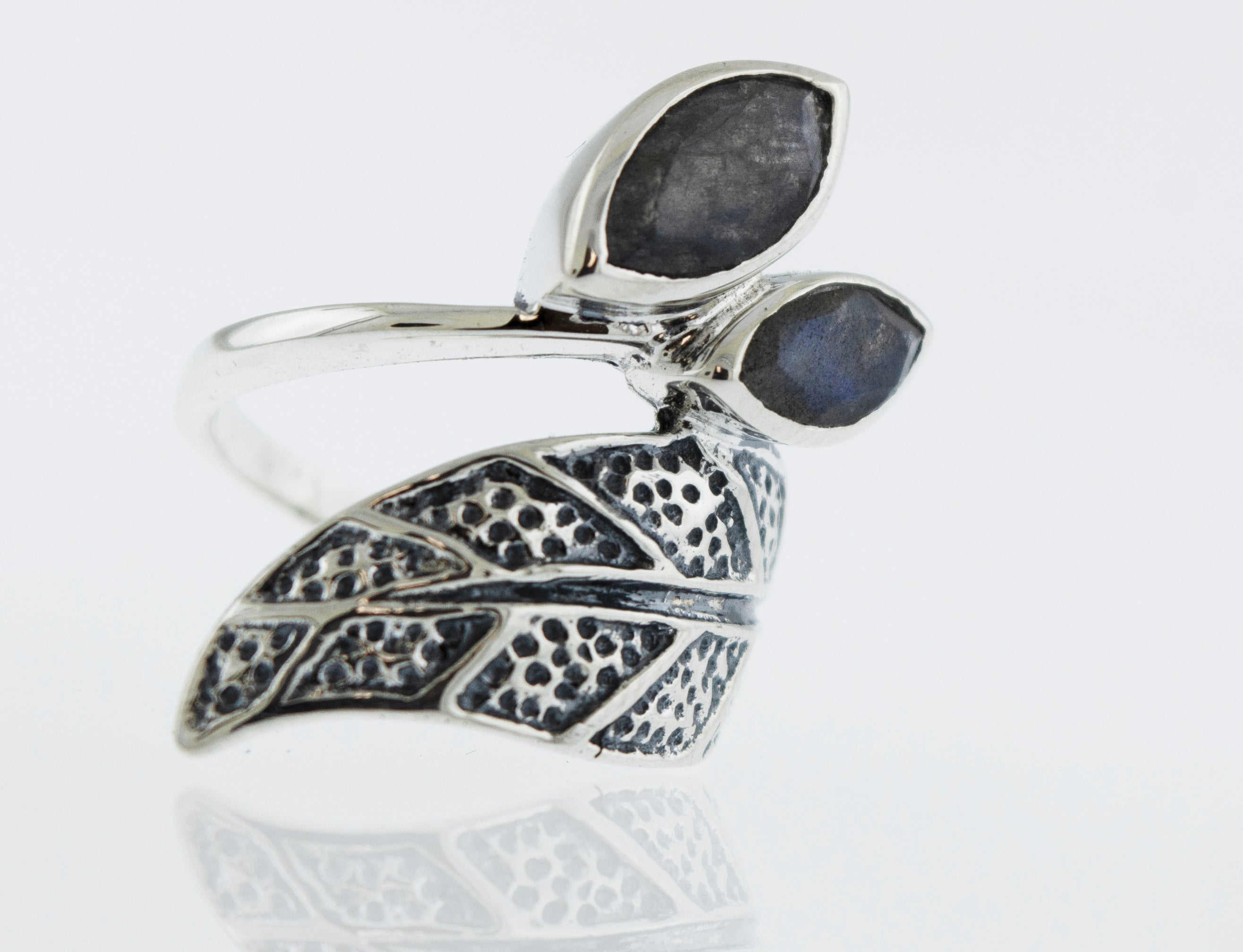 A Super Silver Leaf Ring with Labradorite stone and two leaves.
