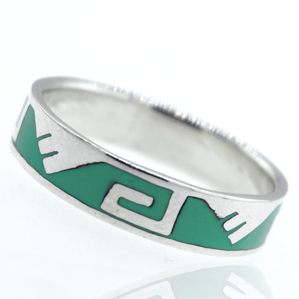 A Greek Wave and Mountain Turquoise Ring with a Grecian wave design by Super Silver.