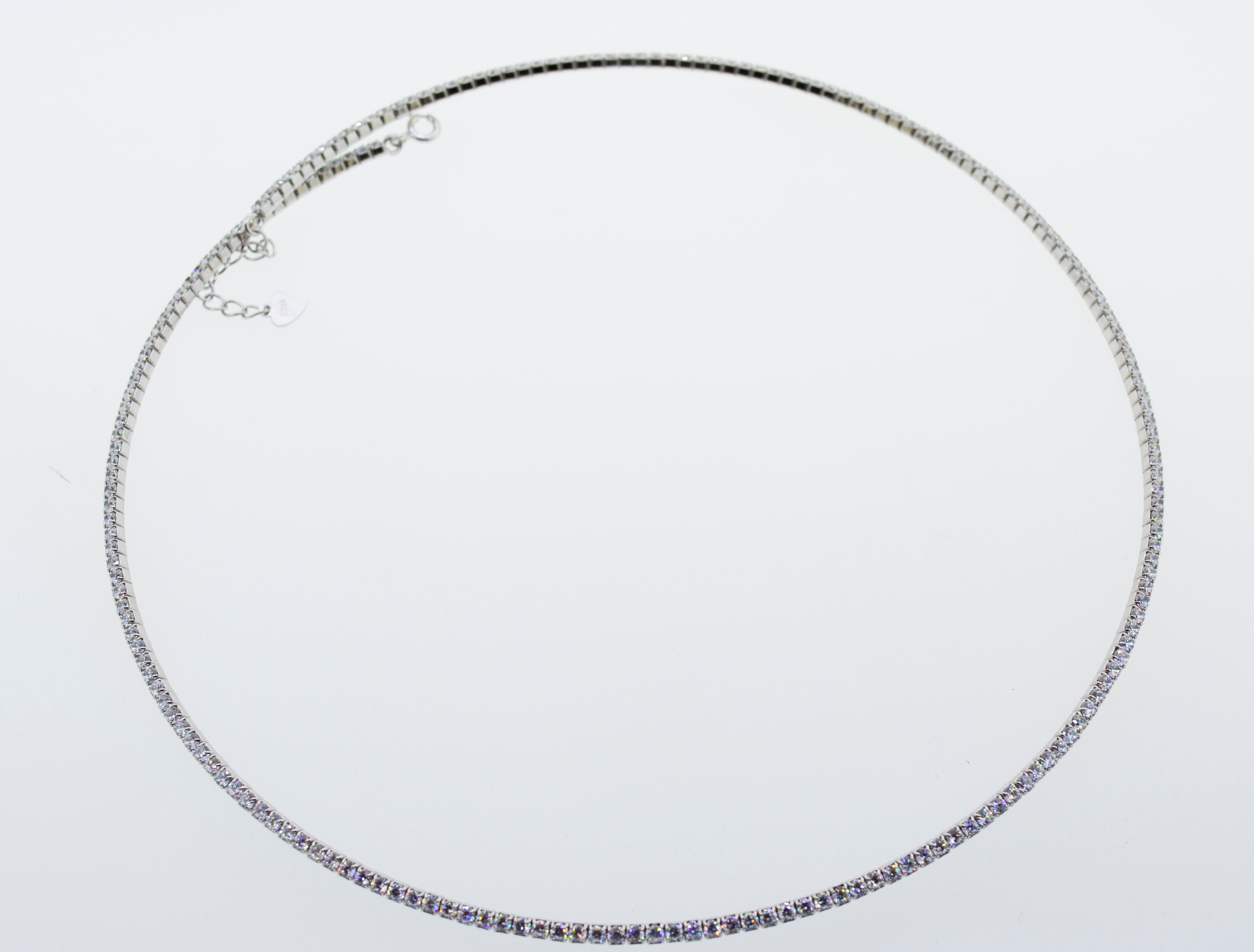 A Super Silver cubic zirconia tennis necklace on a white background.