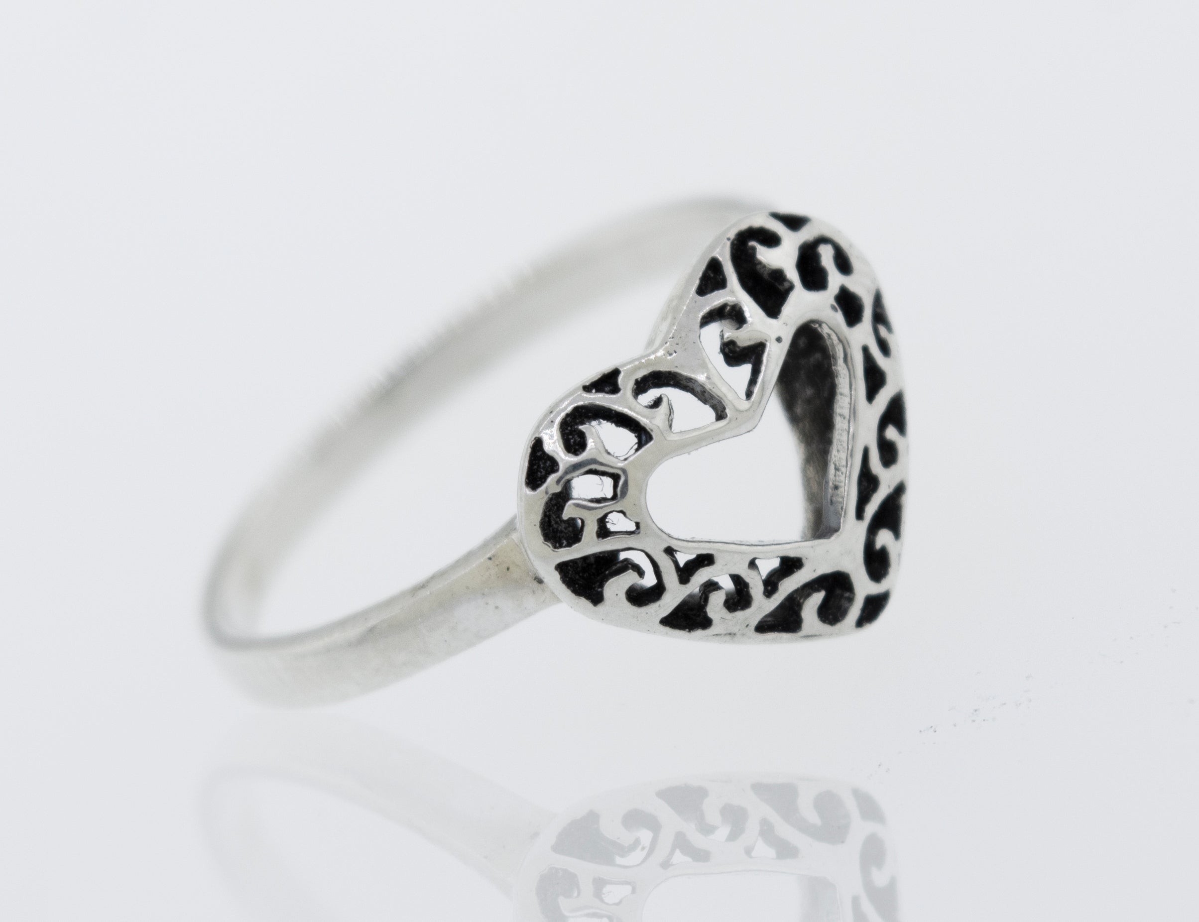 An ornate Heart Shaped Ring with Filigree Detailing, perfect for expressing love and ideal for engagement.