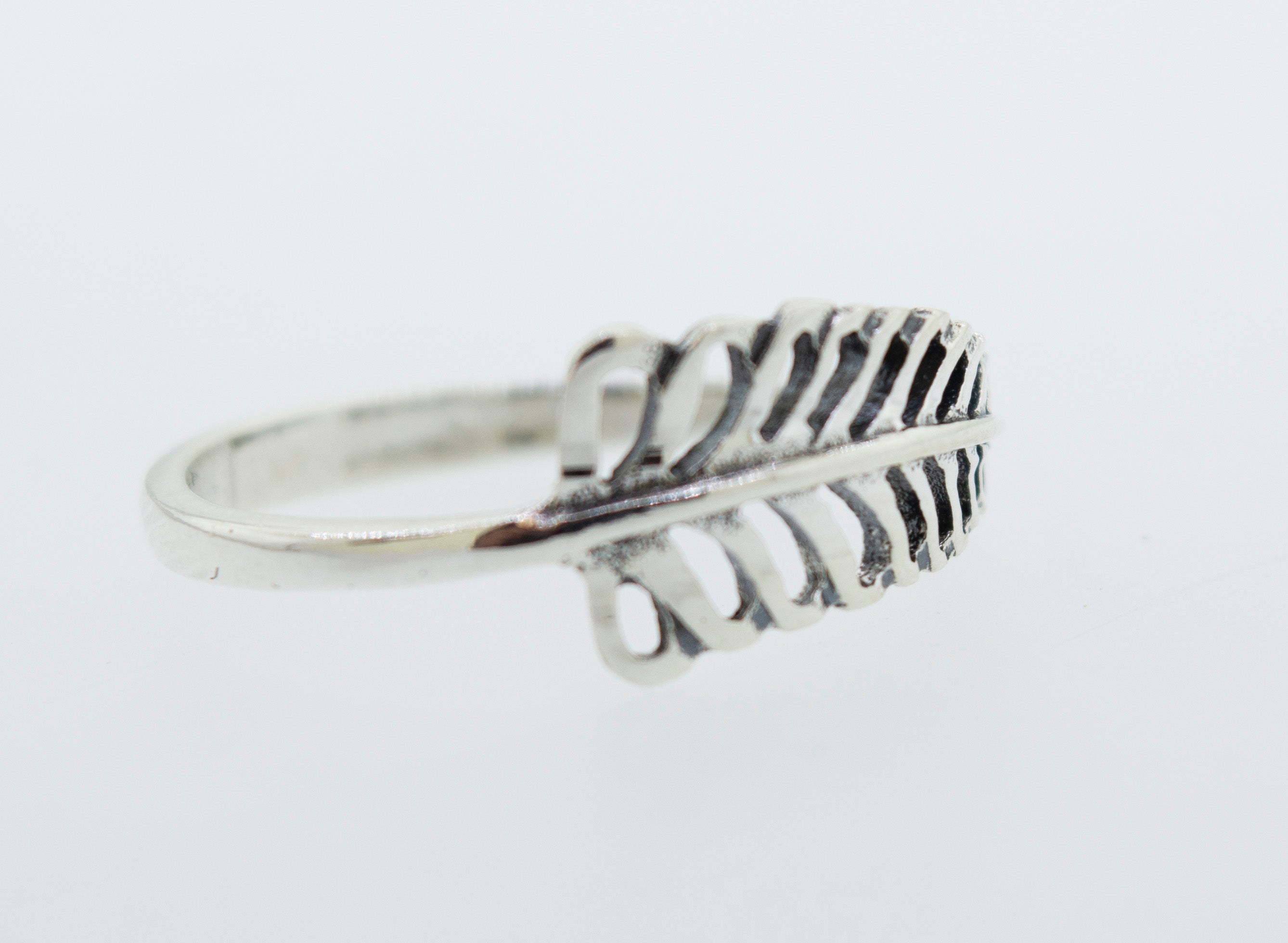 A Super Silver cutout leaf design ring.