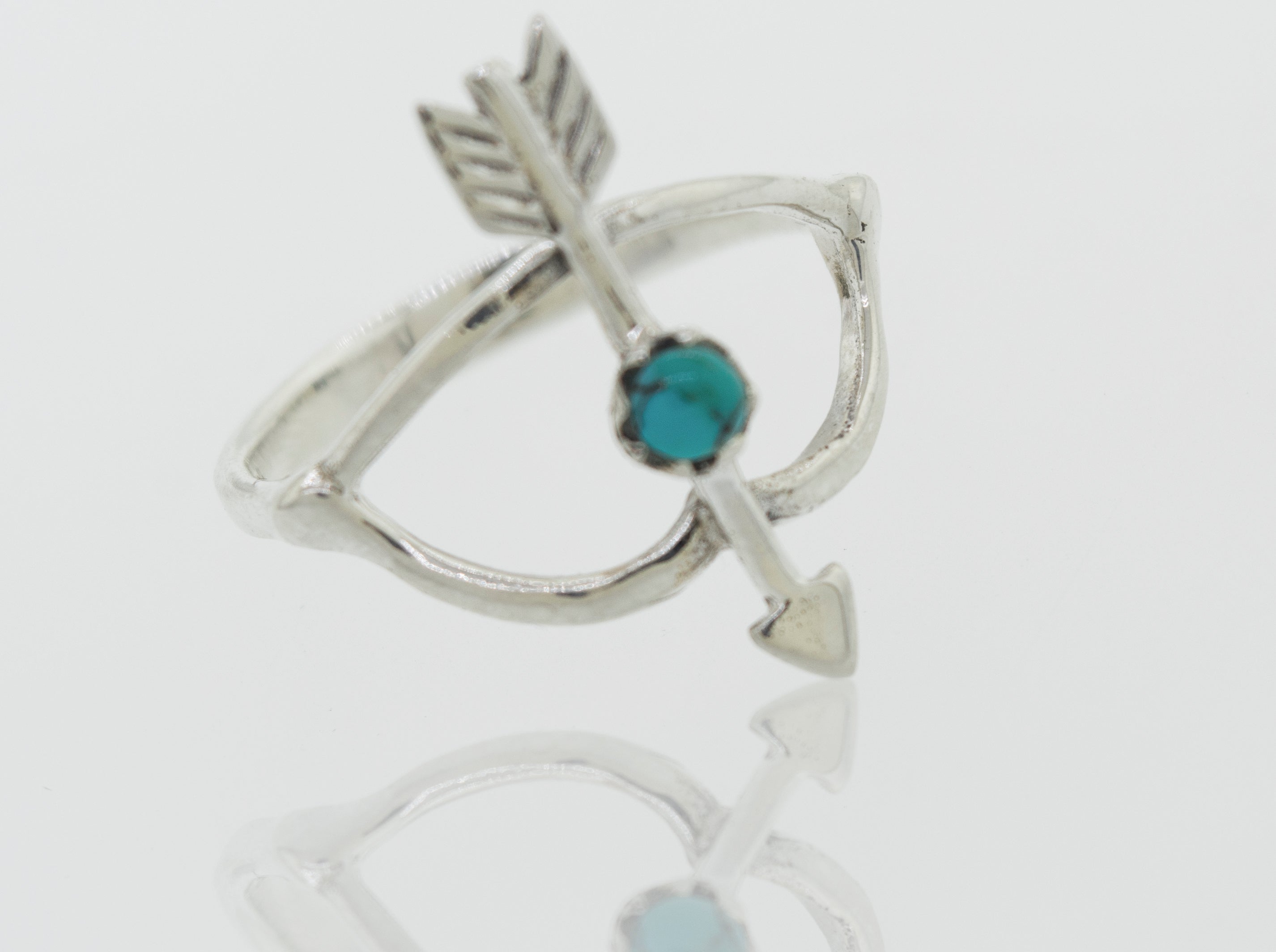 A Super Silver Turquoise Stone Ring With Bow And Arrow Design.