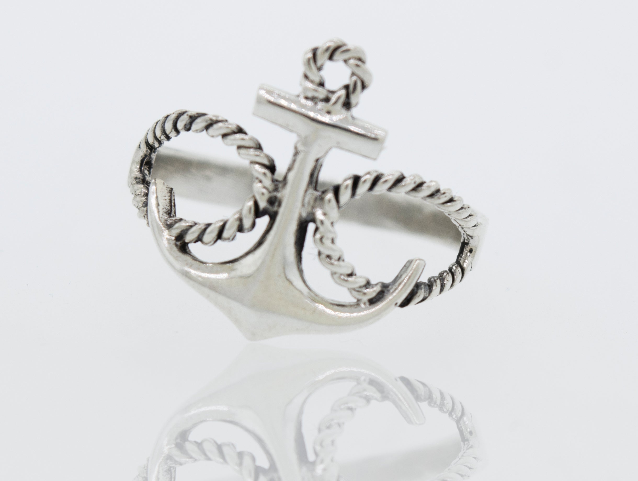 A Super Silver sterling silver anchor ring featuring an open-loop rope design on a white surface.