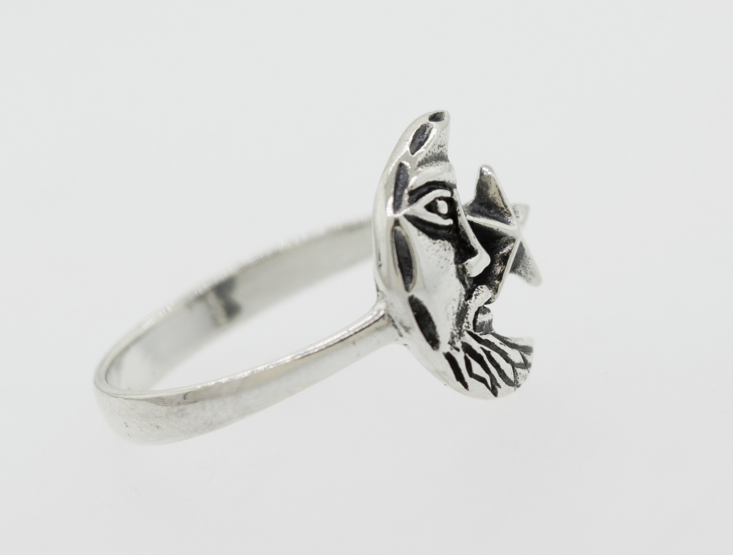 A Man In the Moon ring made of .925 Sterling Silver with a face in the moon, by Super Silver.