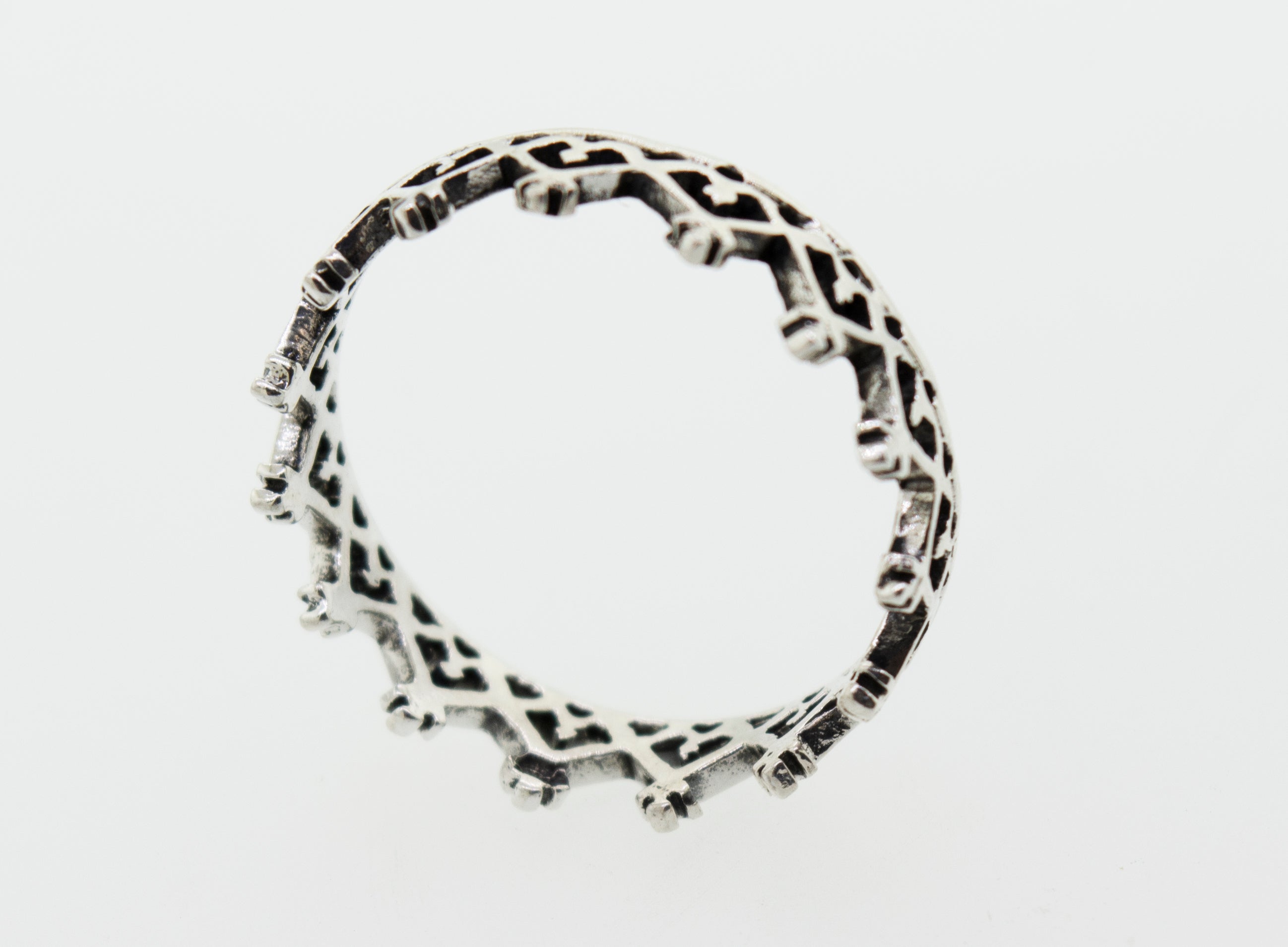 A Super Silver Sterling Silver Crown Ring with freestyle black and white designs.