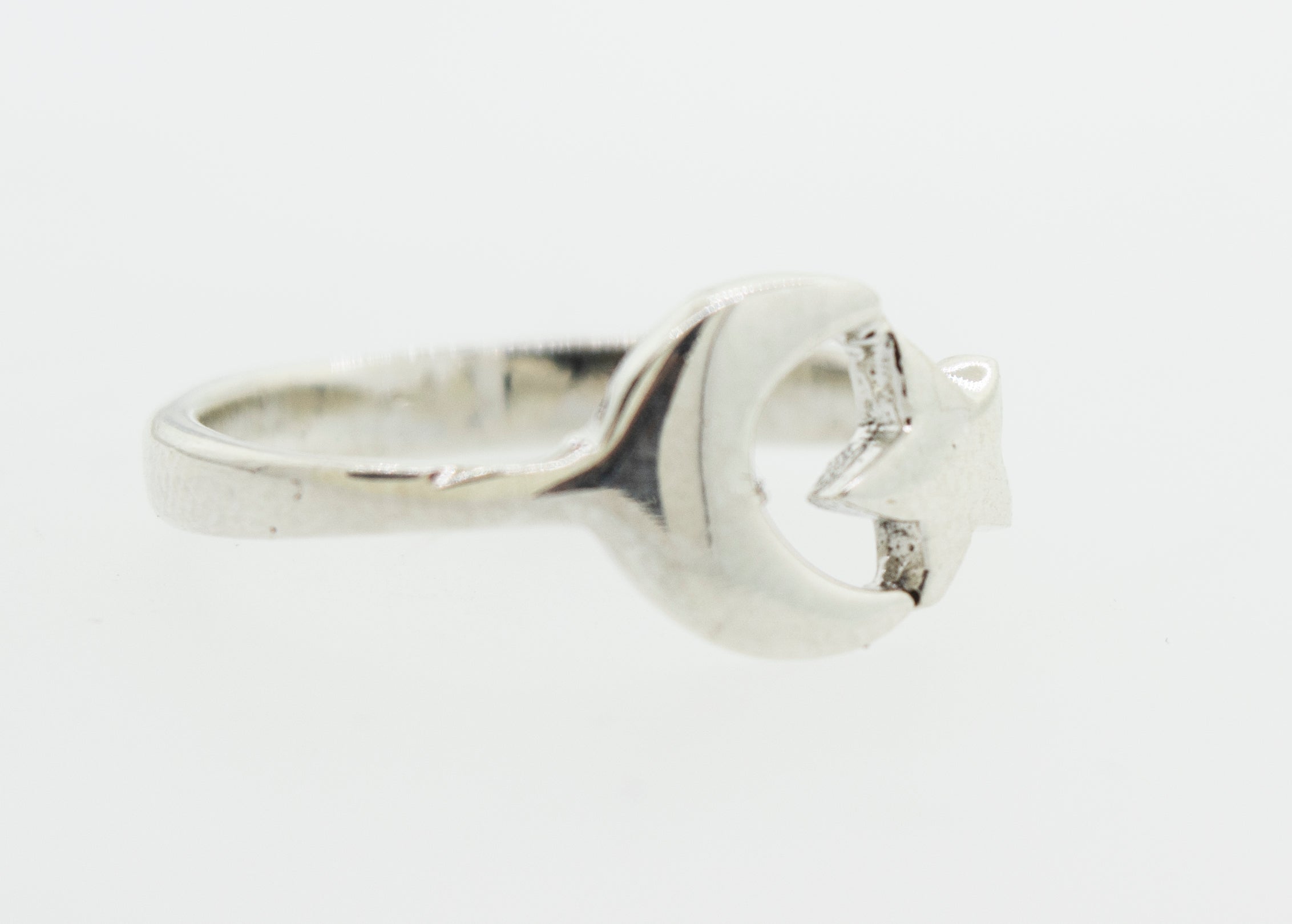 A Super Silver Crescent Moon And Star Ring.