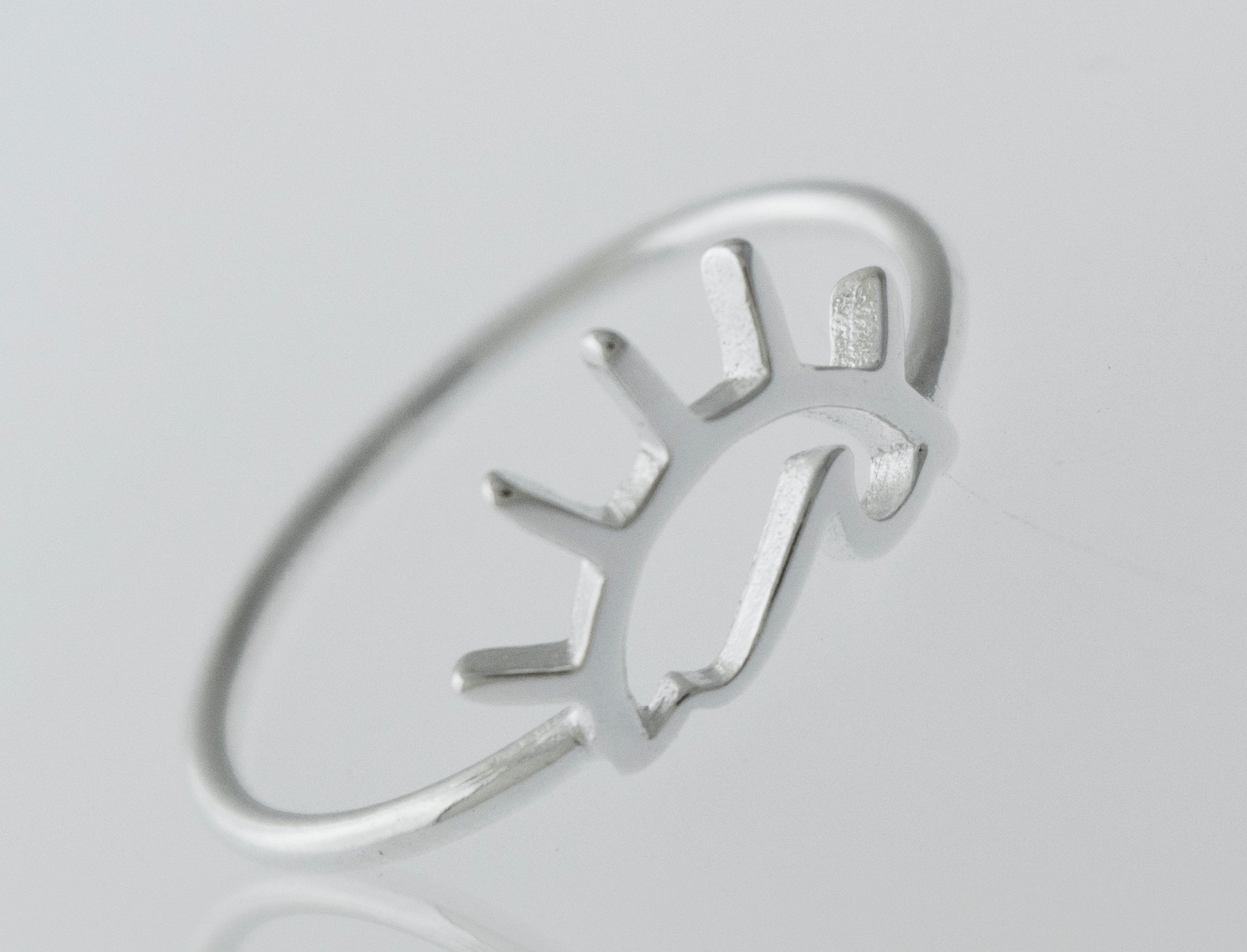 A Sunset Wave Ring made of 925 sterling silver, featuring a sun in the middle, by Super Silver.