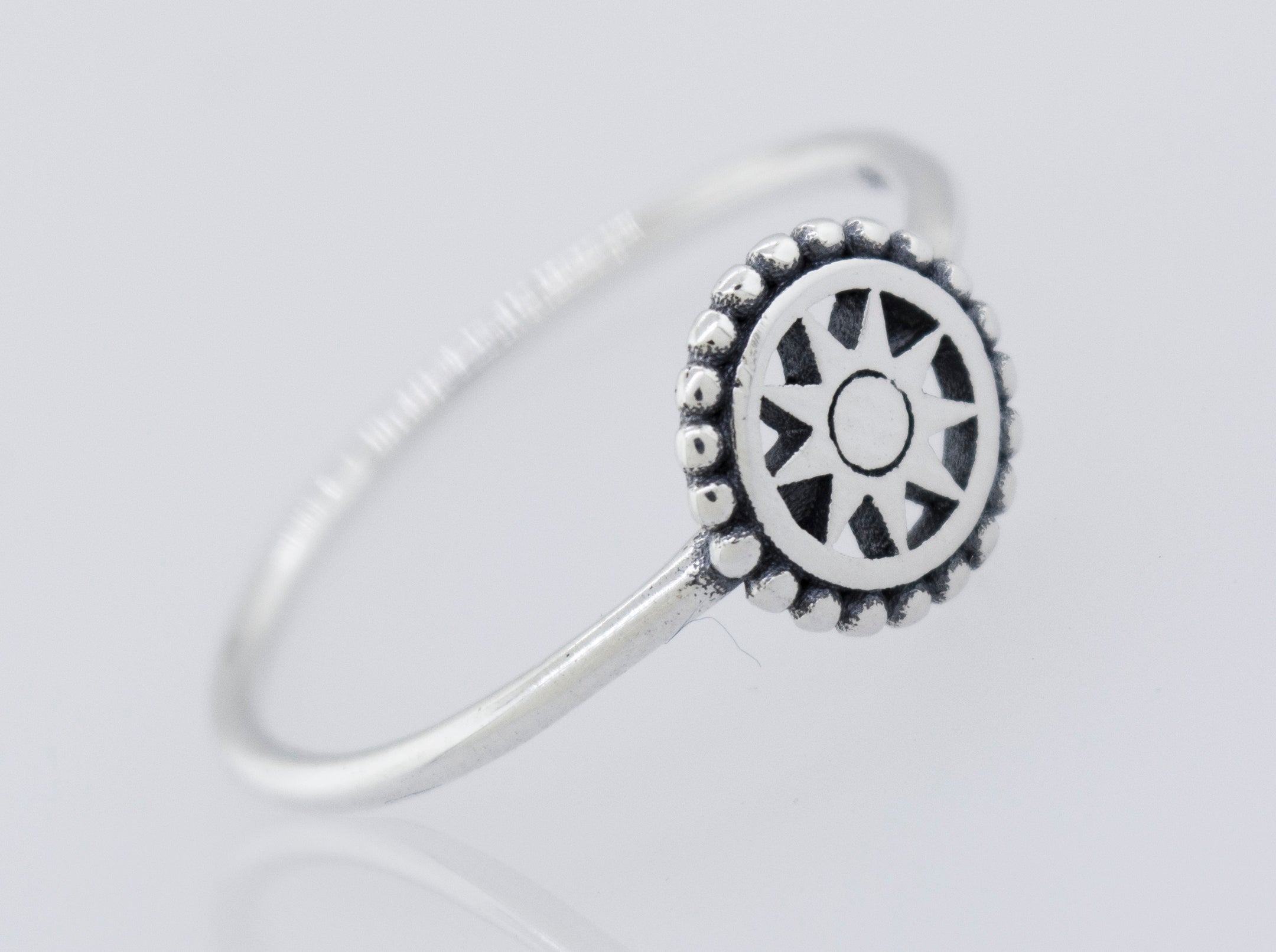 A high polish 925 sterling silver Compass Ring by Super Silver featuring a sun wheel design.