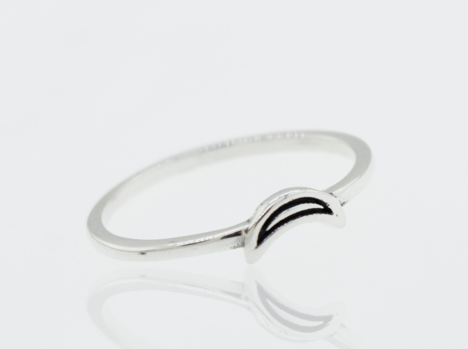 A Tiny Crescent Moon silver ring with a black and white design.