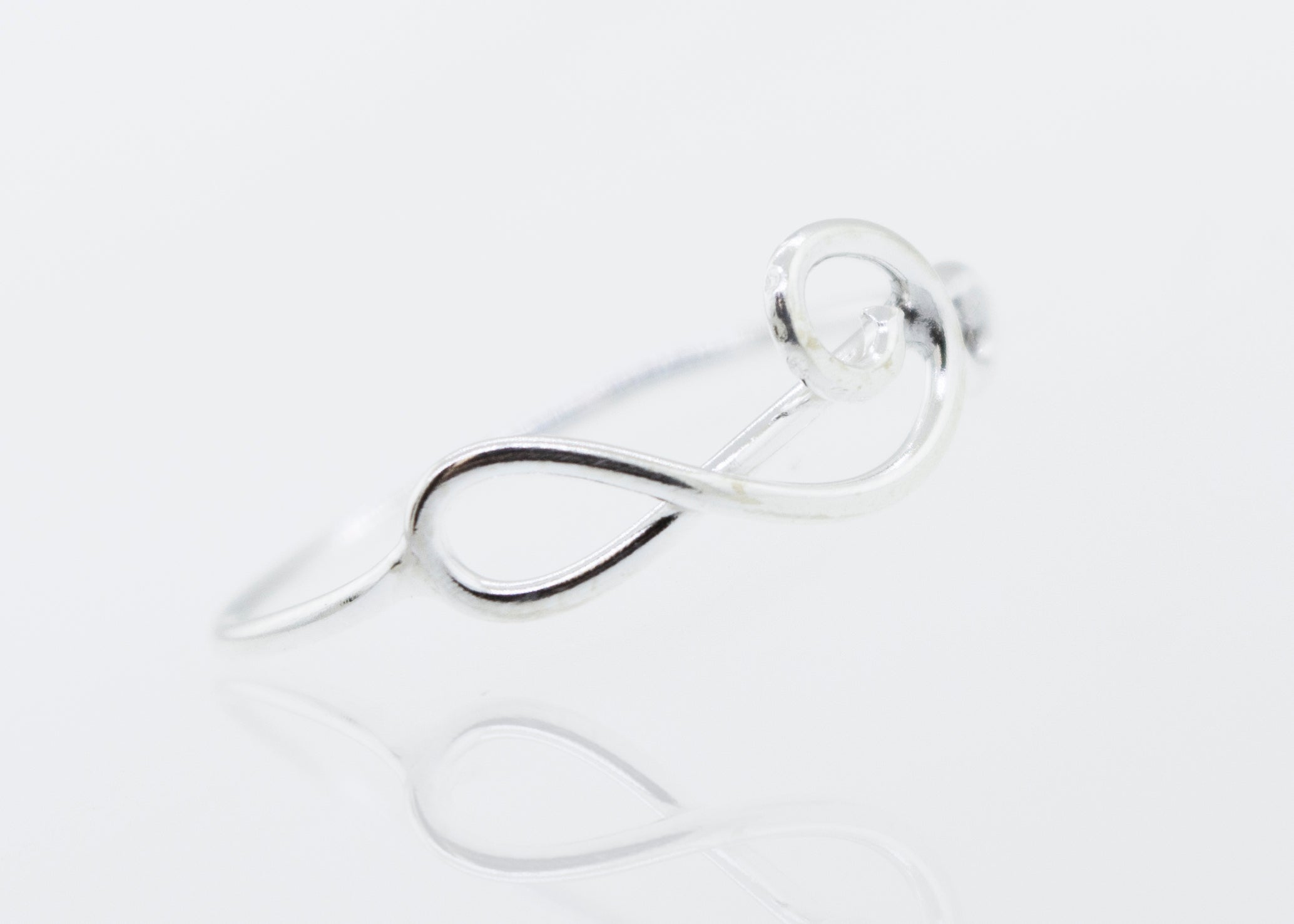 A high polish Super Silver Horizontal Treble Clef Ring with a treble clef design on a white surface.